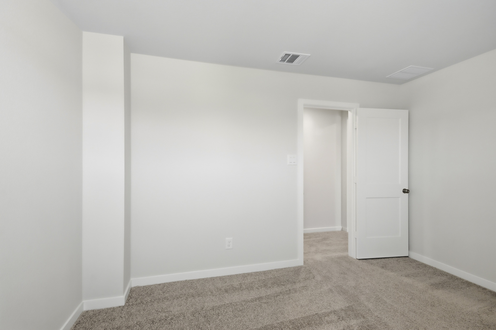 A room with white walls.