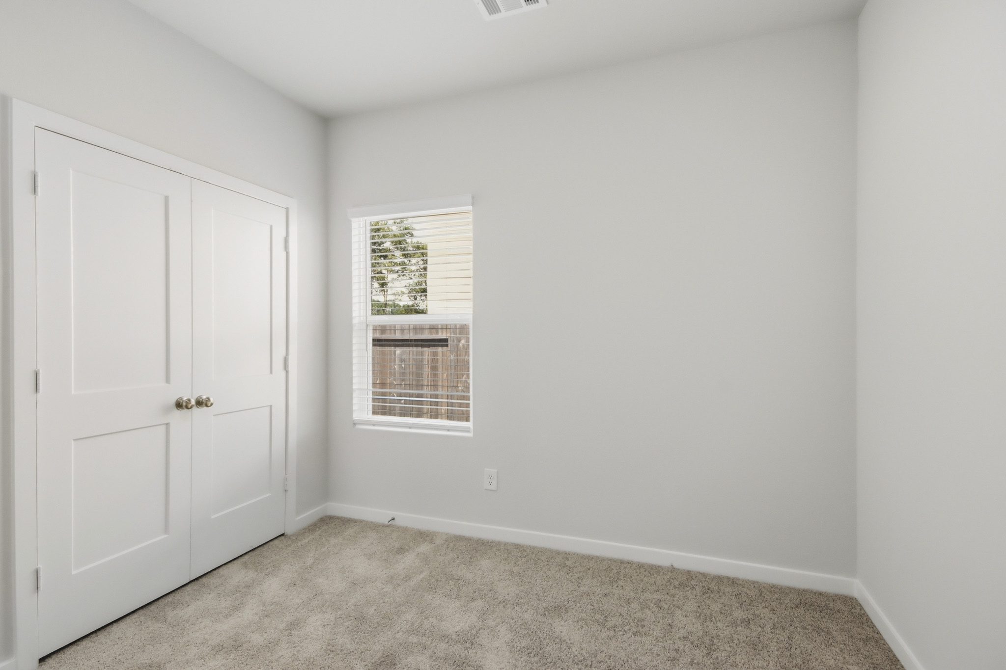A room with white doors.