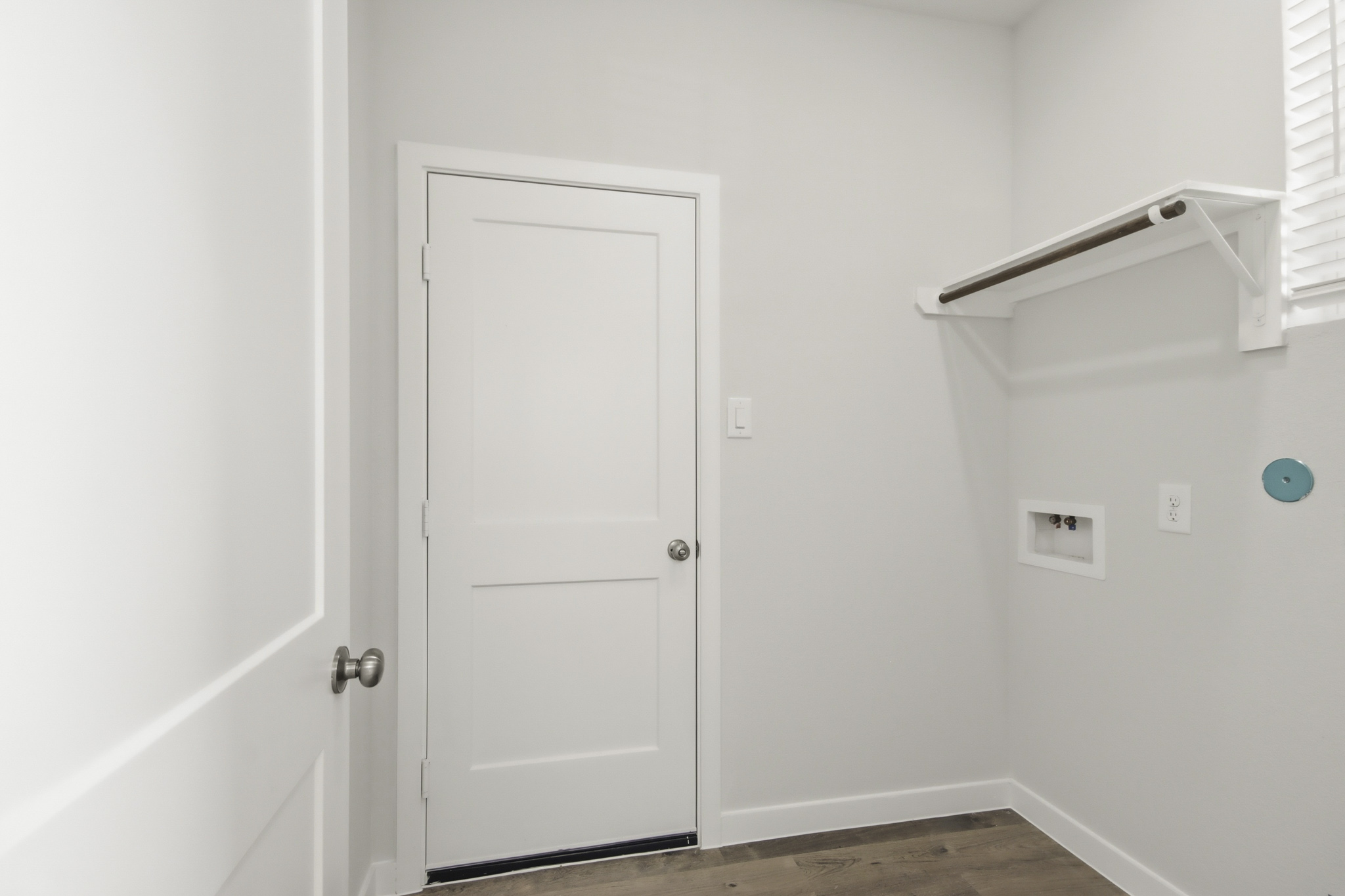 A white door in a room.