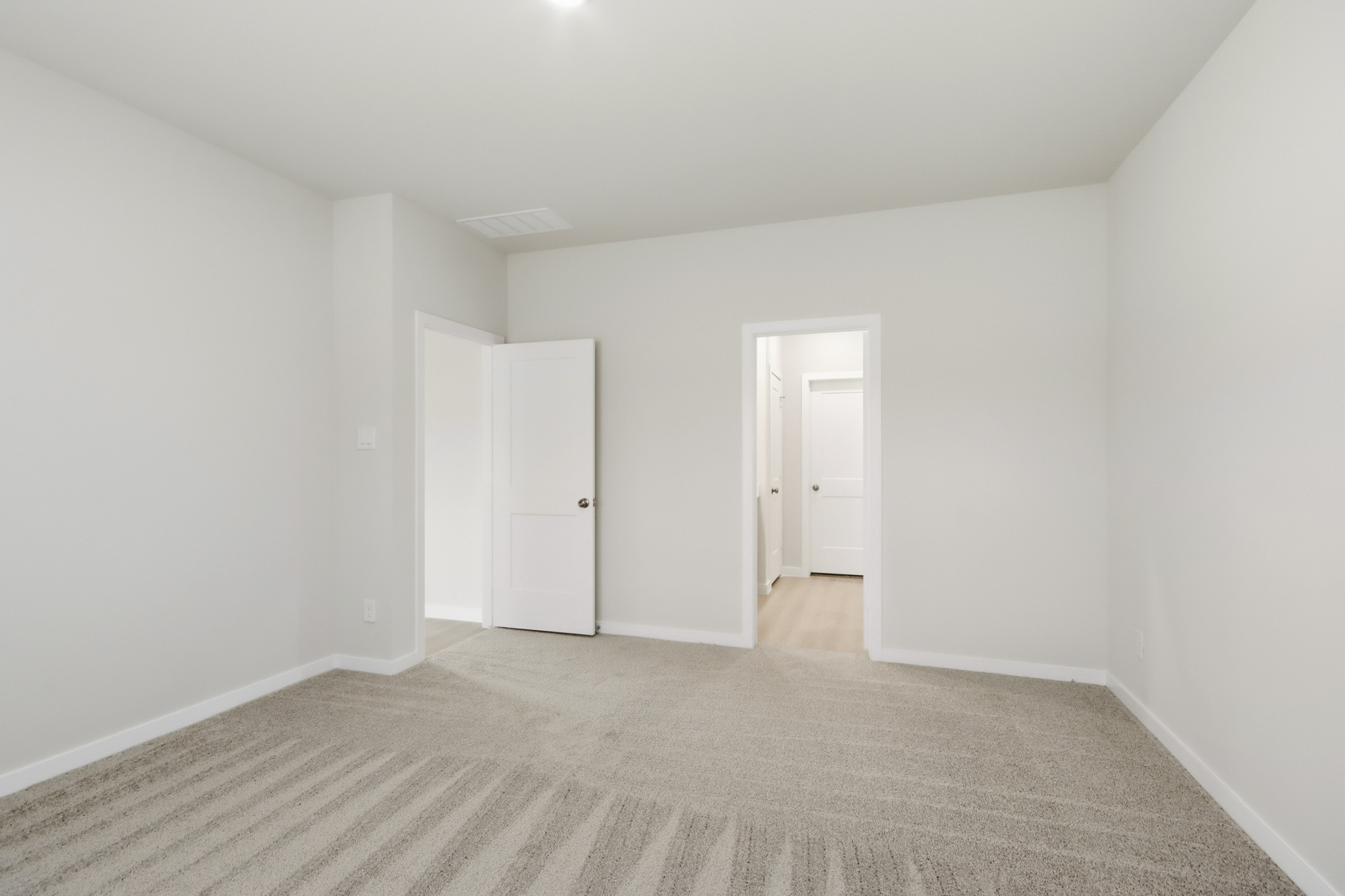 A room with white doors.