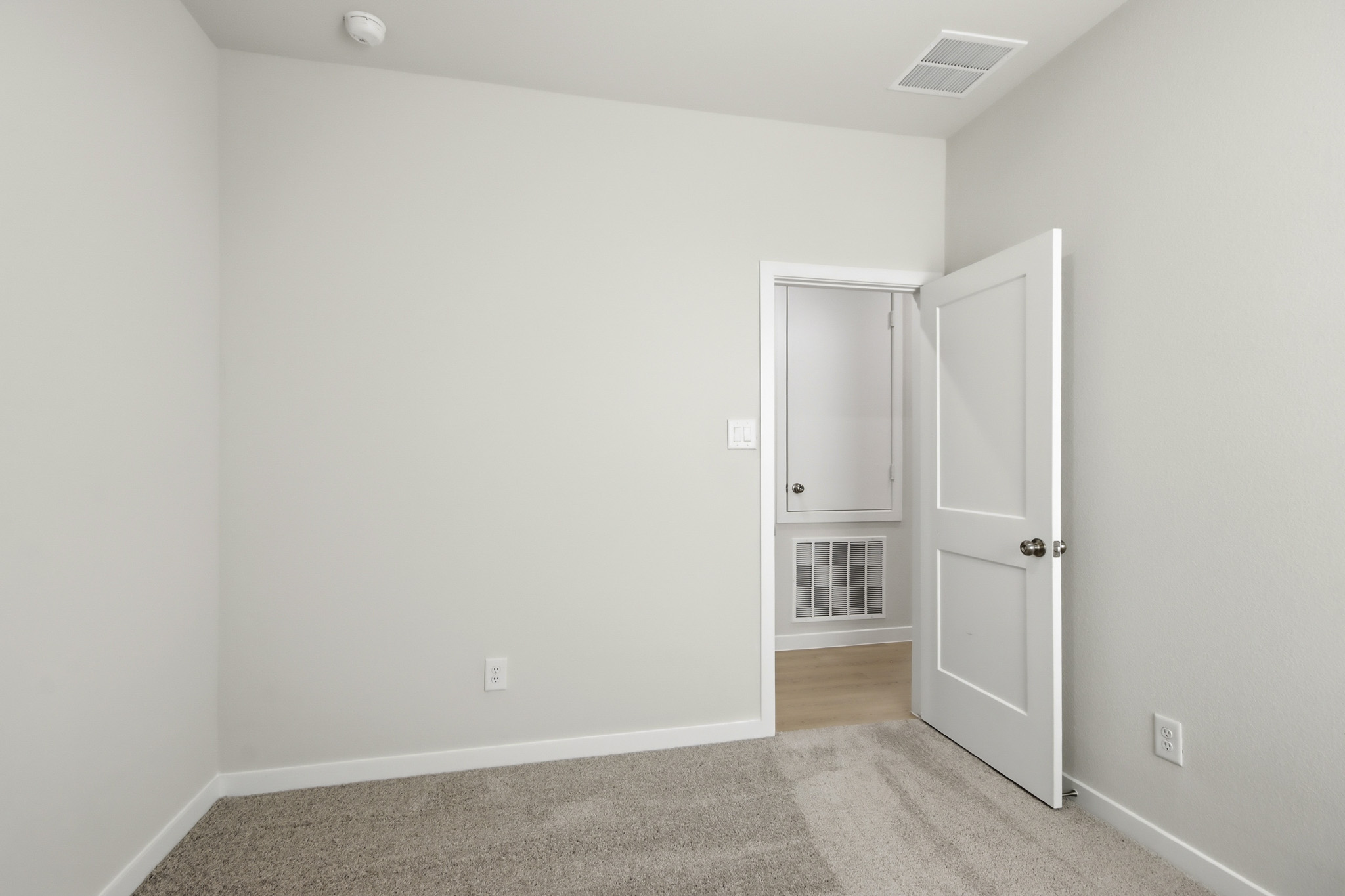 A room with white walls.