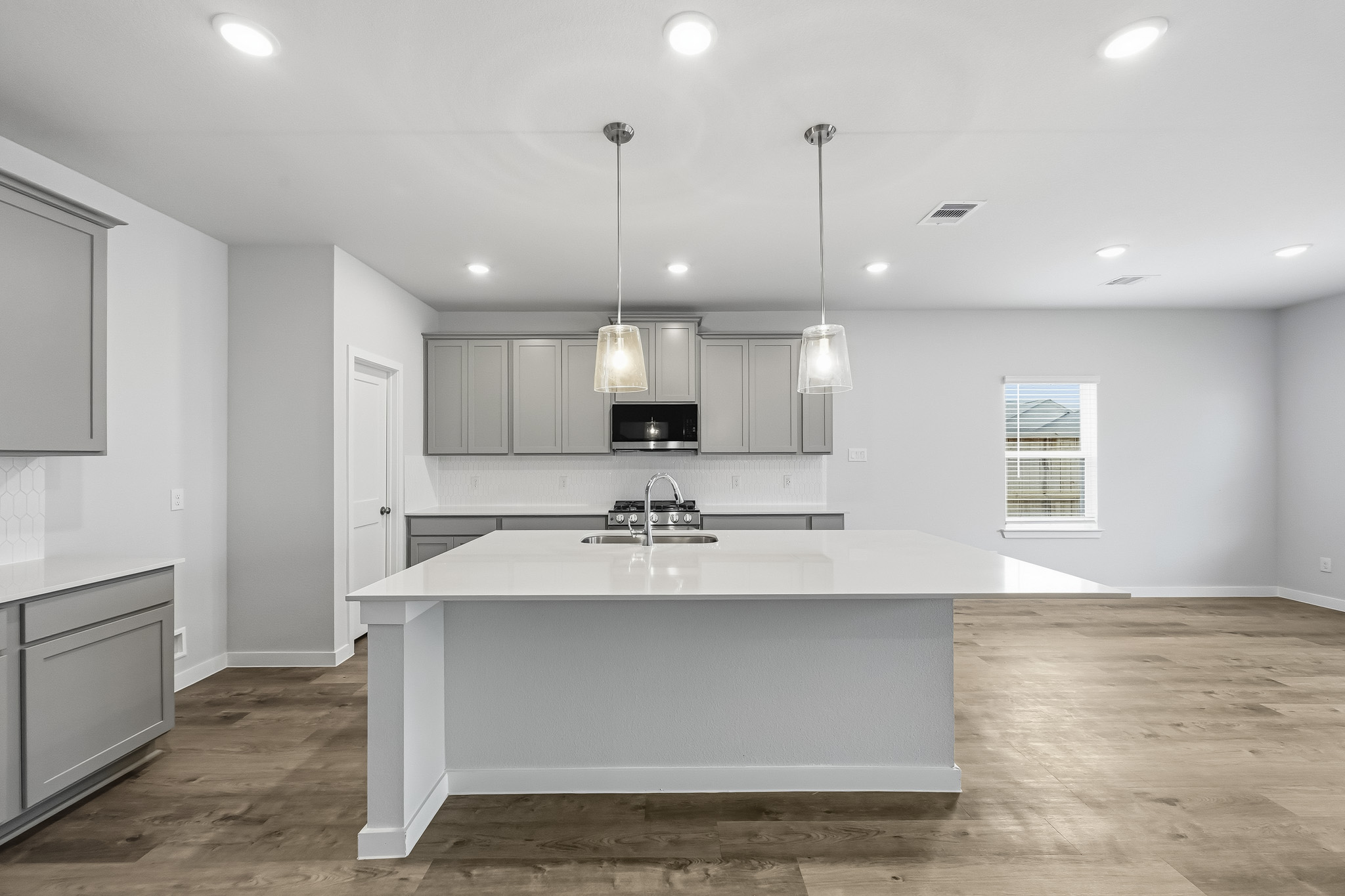 A kitchen with a large island.