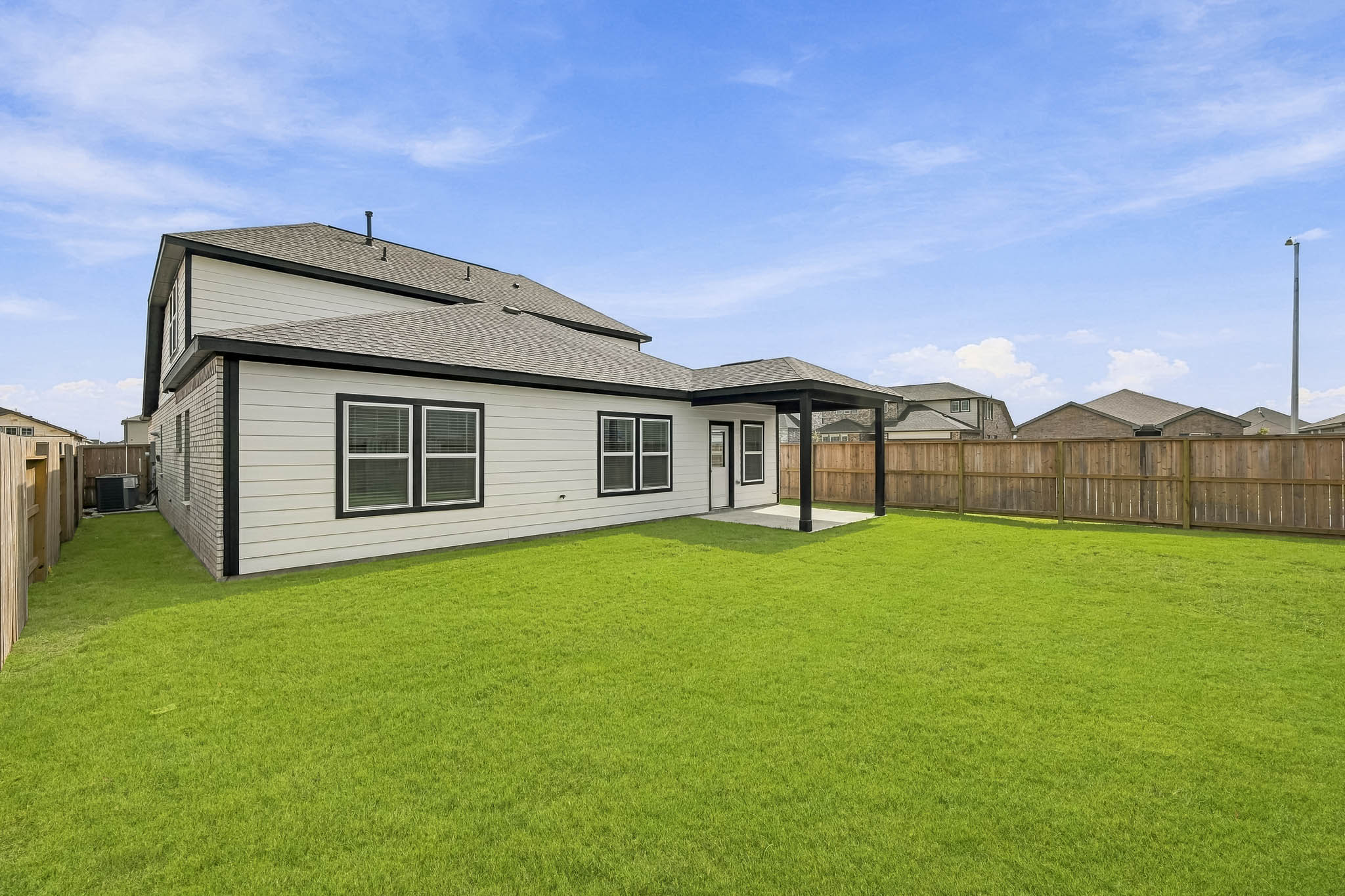 A house with a fence around it.