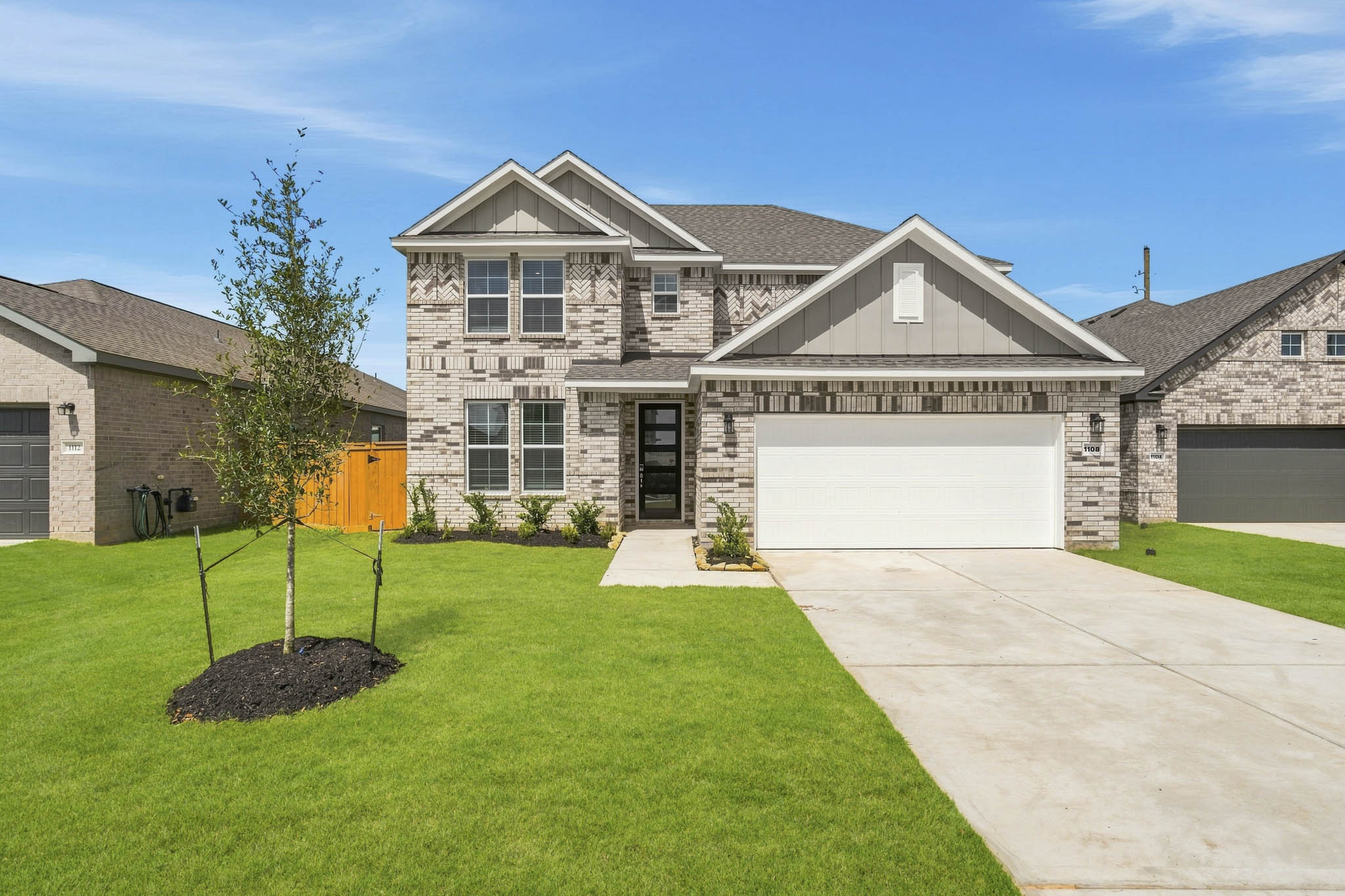 A house with a large front yard.
