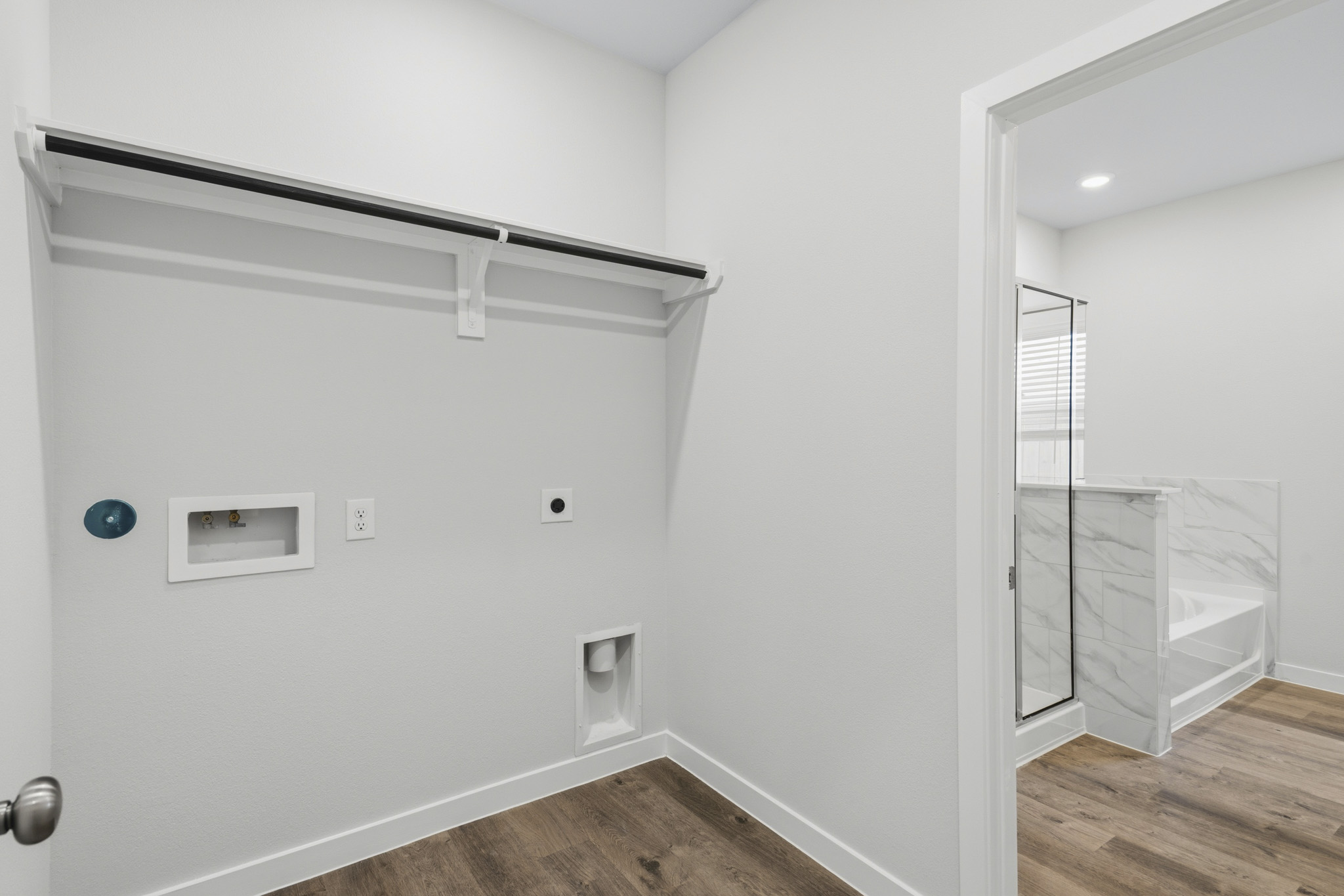 A white room with a white wall.