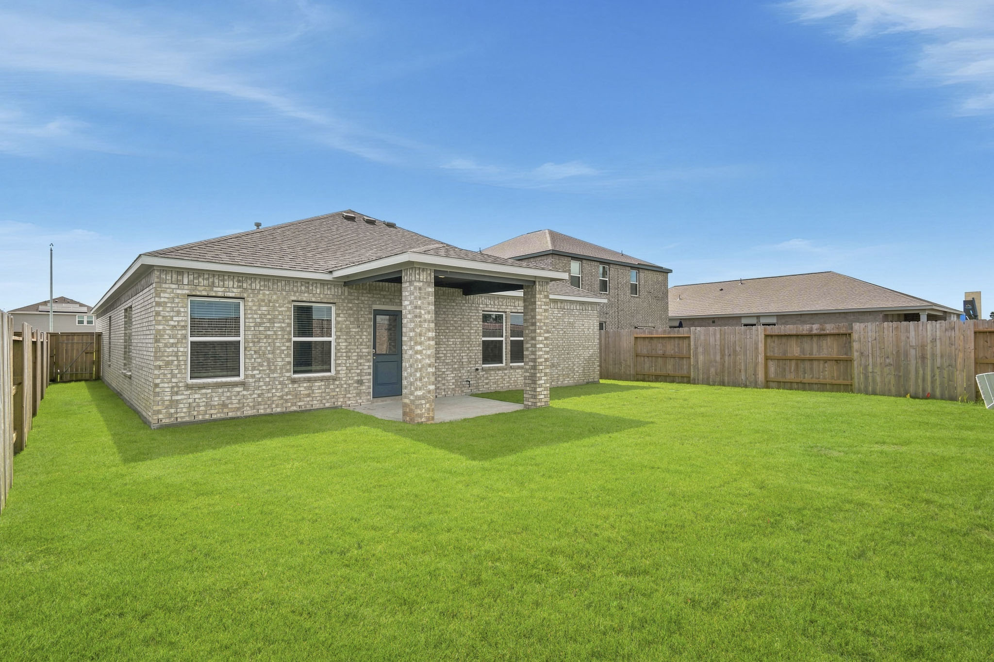 A house with a fence around it.