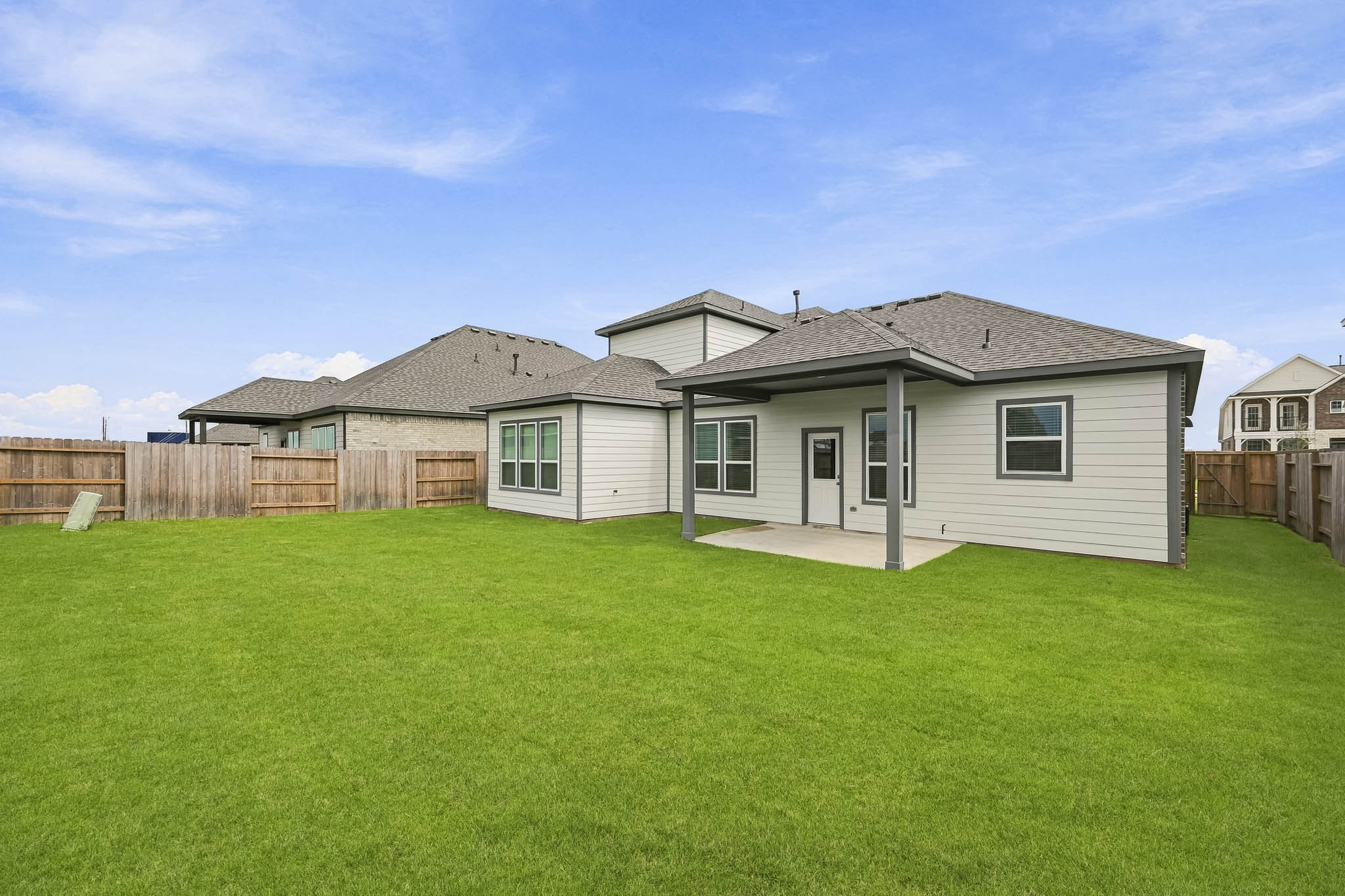 A house with a fence around it.