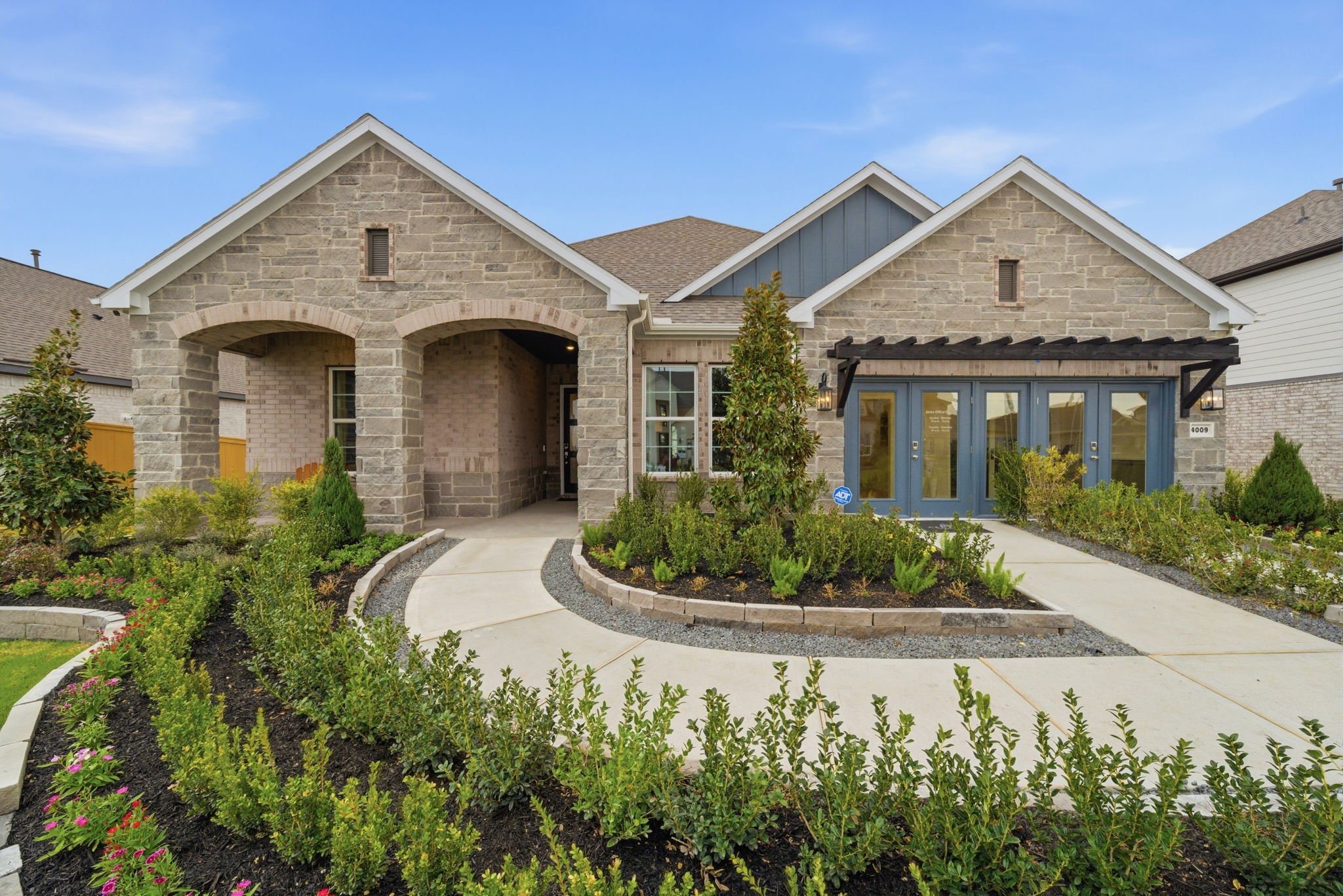 A house with a large front yard.