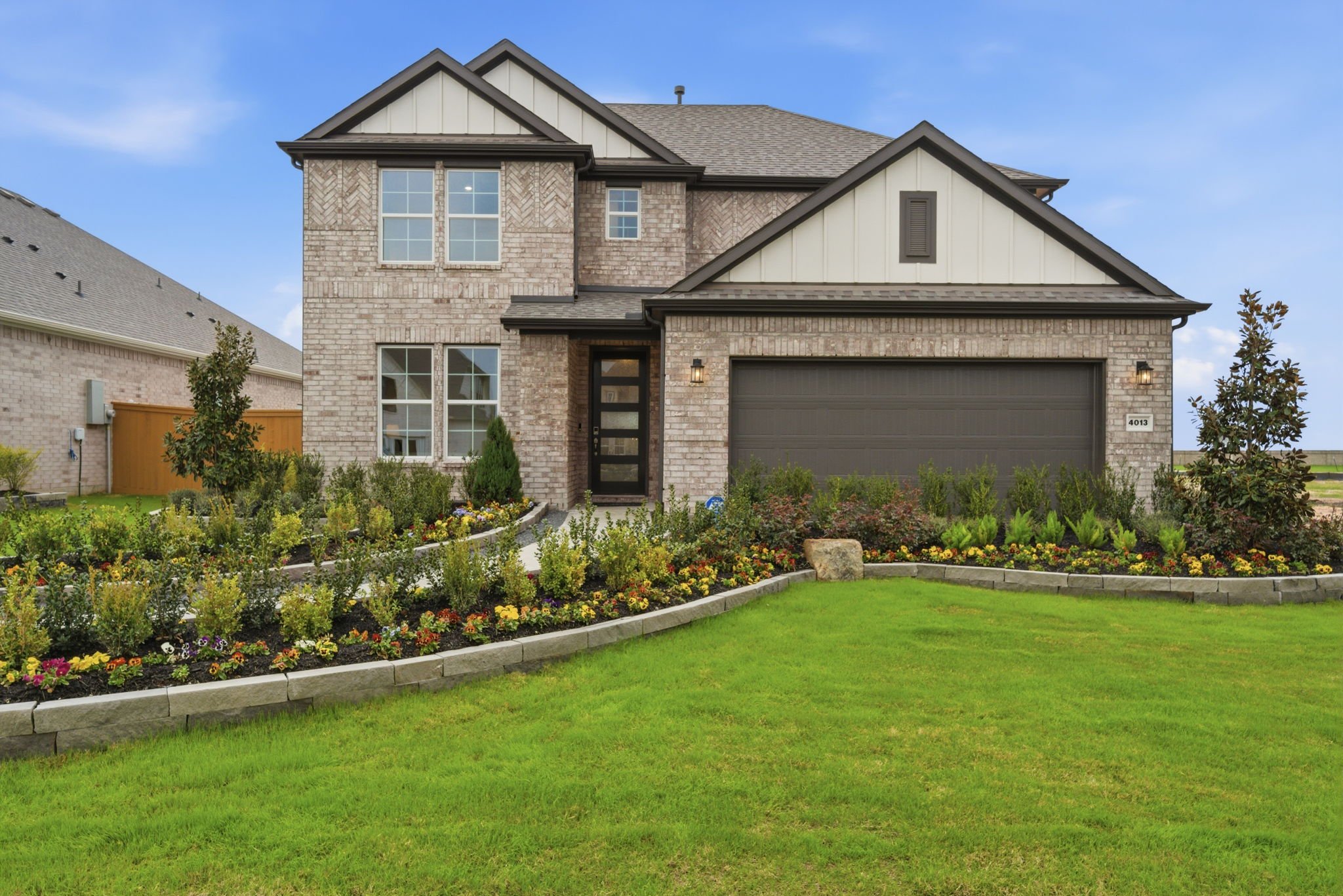 A house with a large front yard.