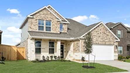A house with a large front yard.