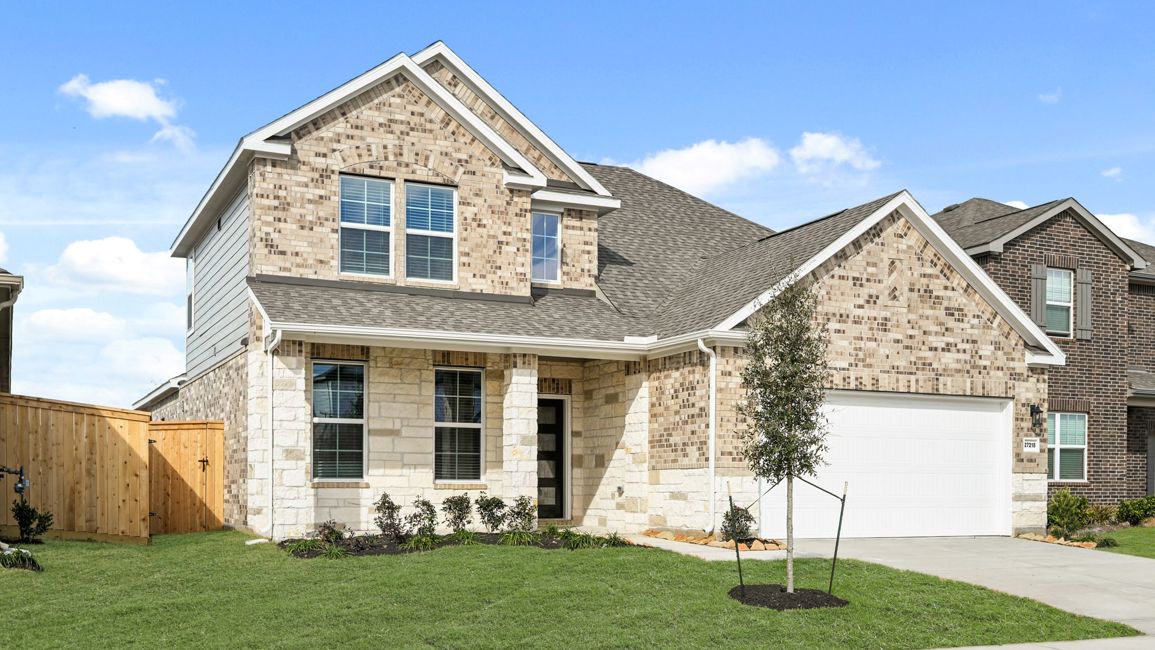 A house with a large front yard.