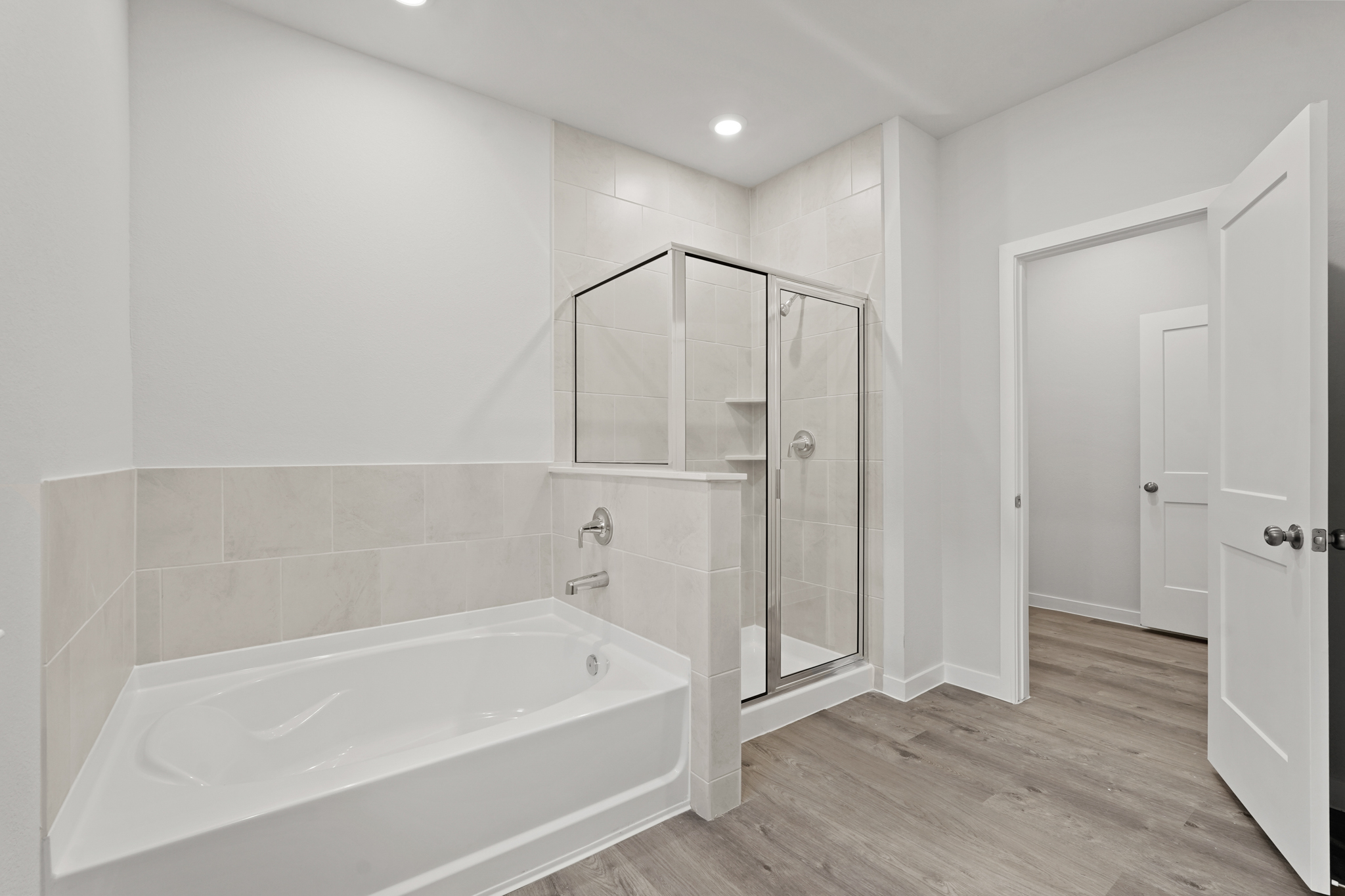 A bathroom with a glass shower.