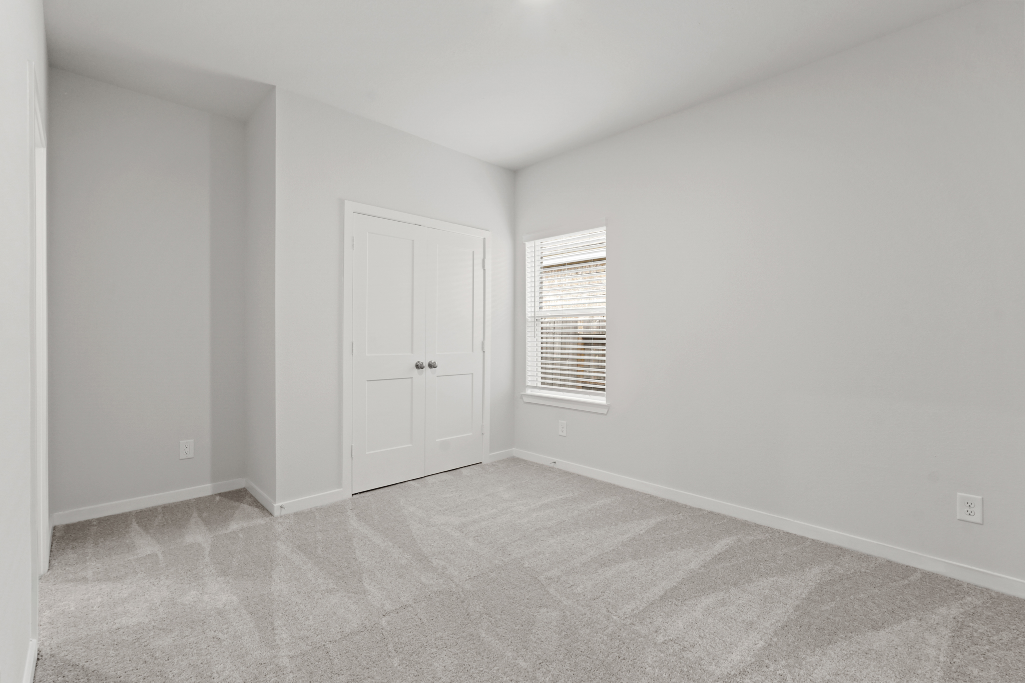 A room with white doors.