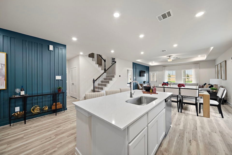 A kitchen with a large island.