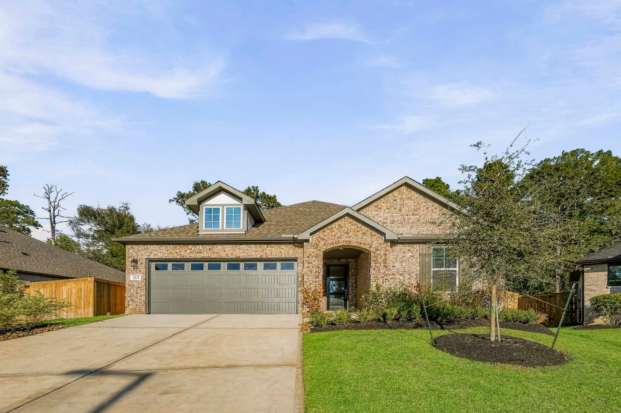 A house with a driveway.
