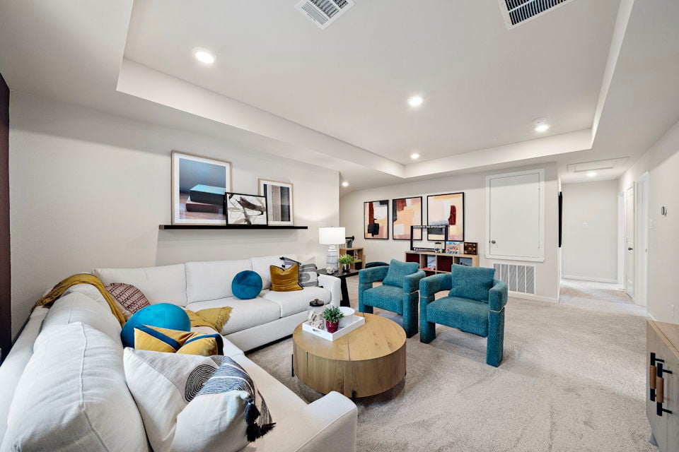A living room with a couch and a coffee table.
