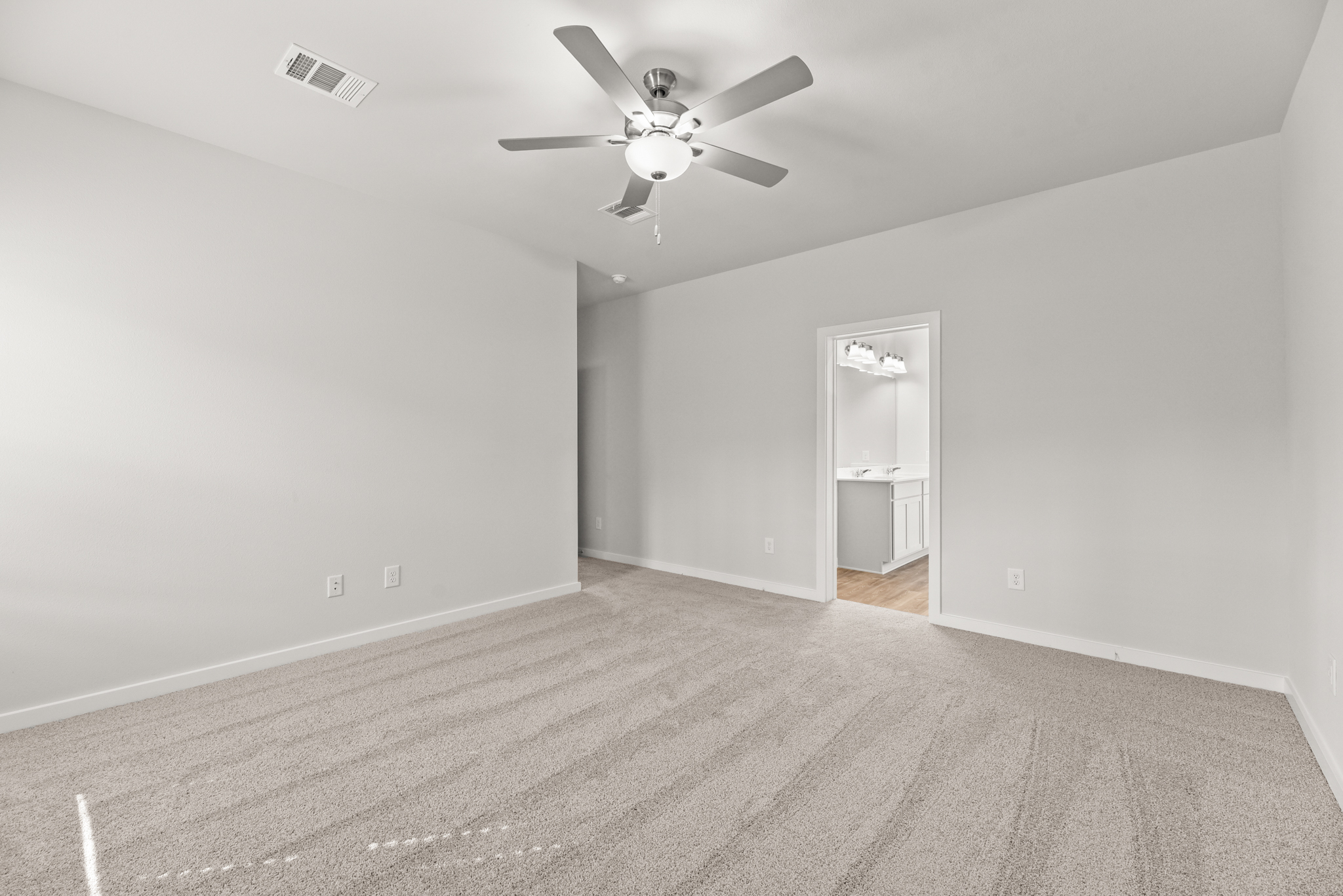 A ceiling fan in a room.