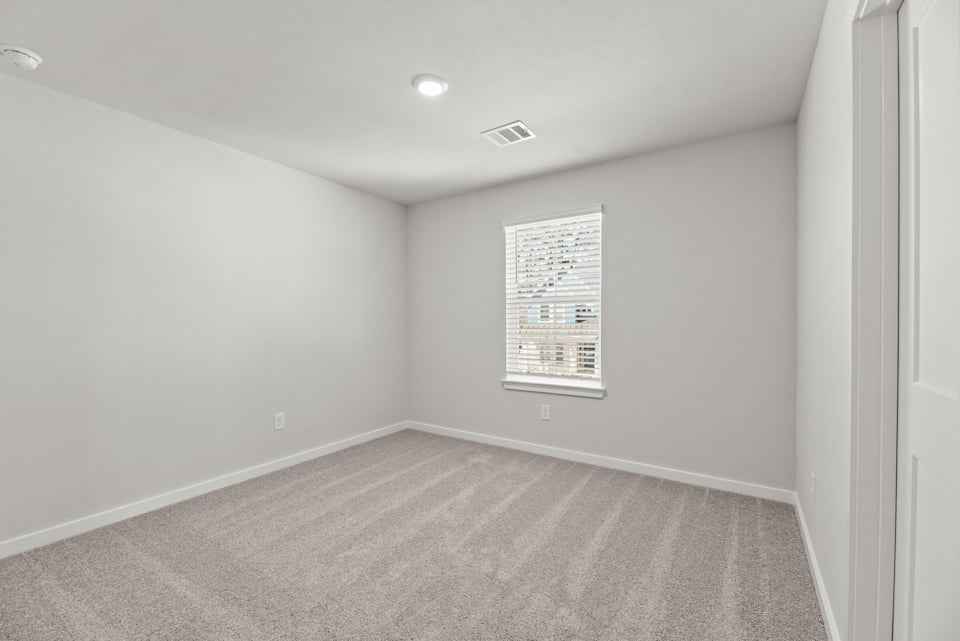 A room with a sign on the wall.