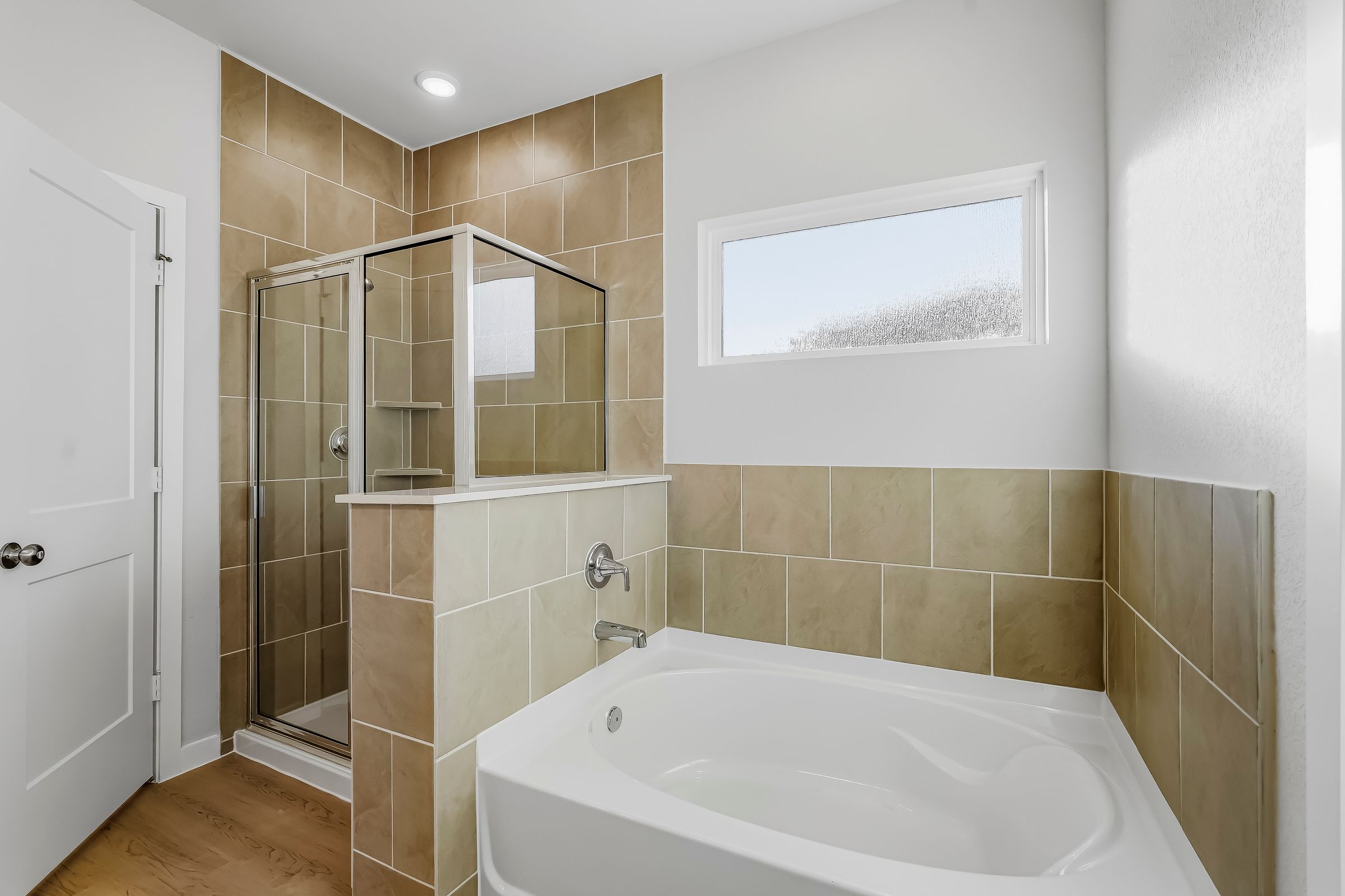 A bathroom with a glass shower.