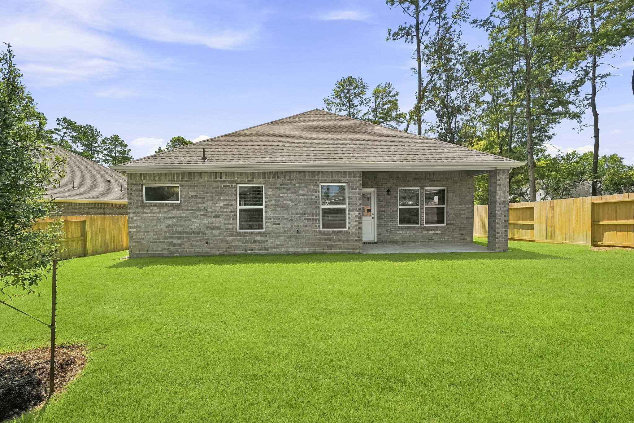 A house with a fence around it.