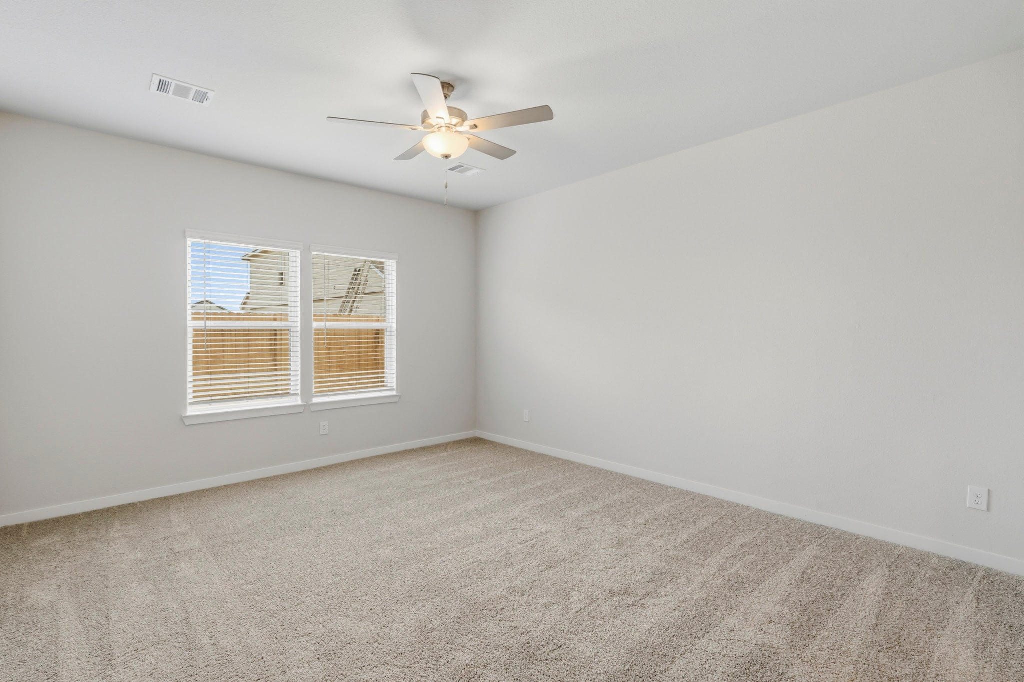 A ceiling fan in a room.