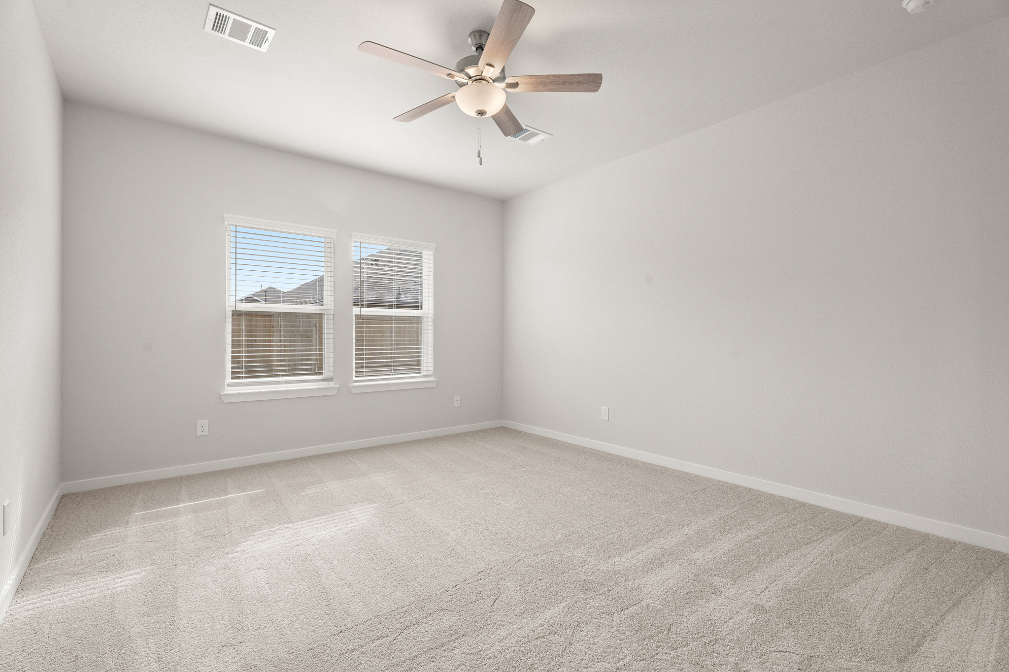 A ceiling fan in a room.