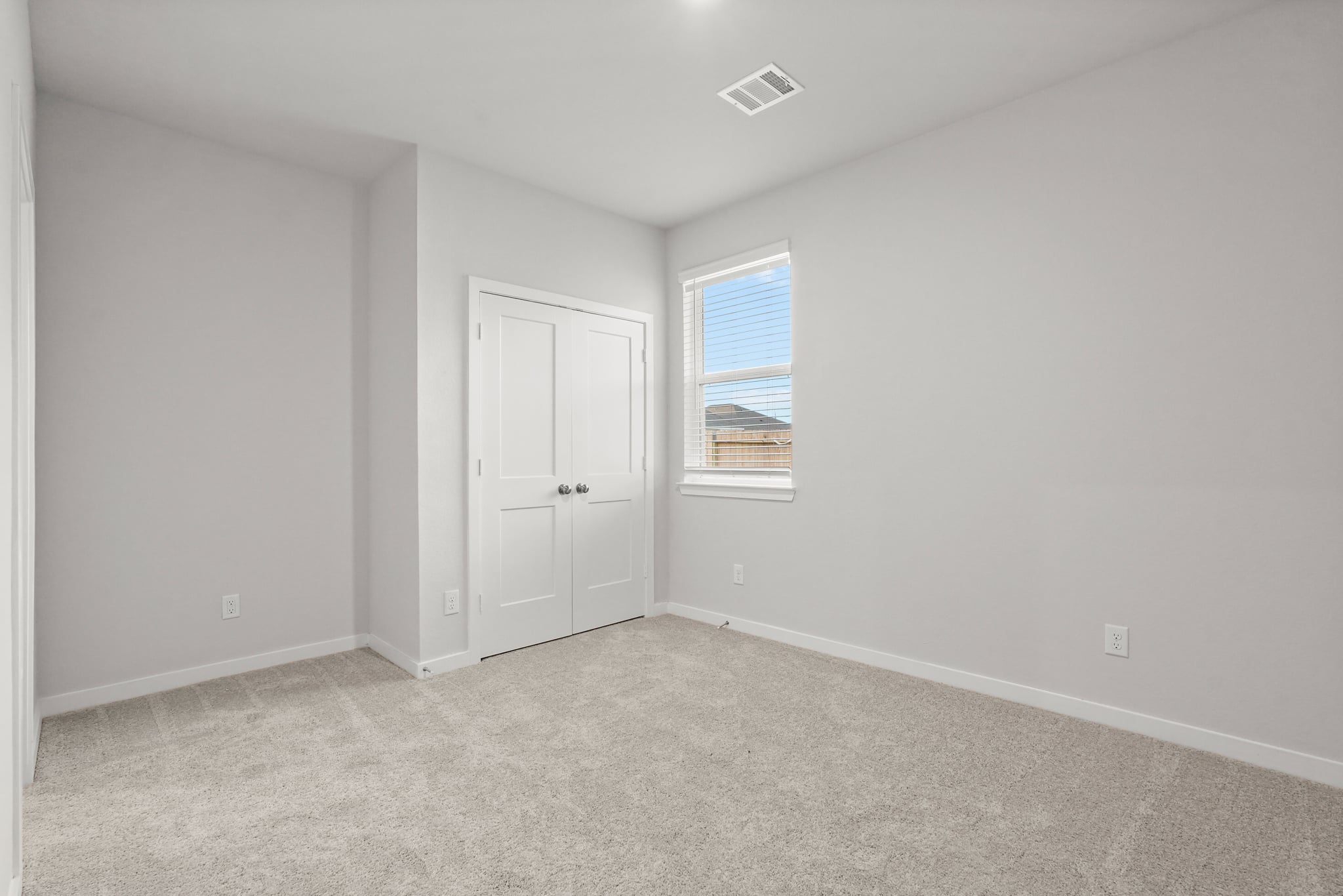 A room with white doors.