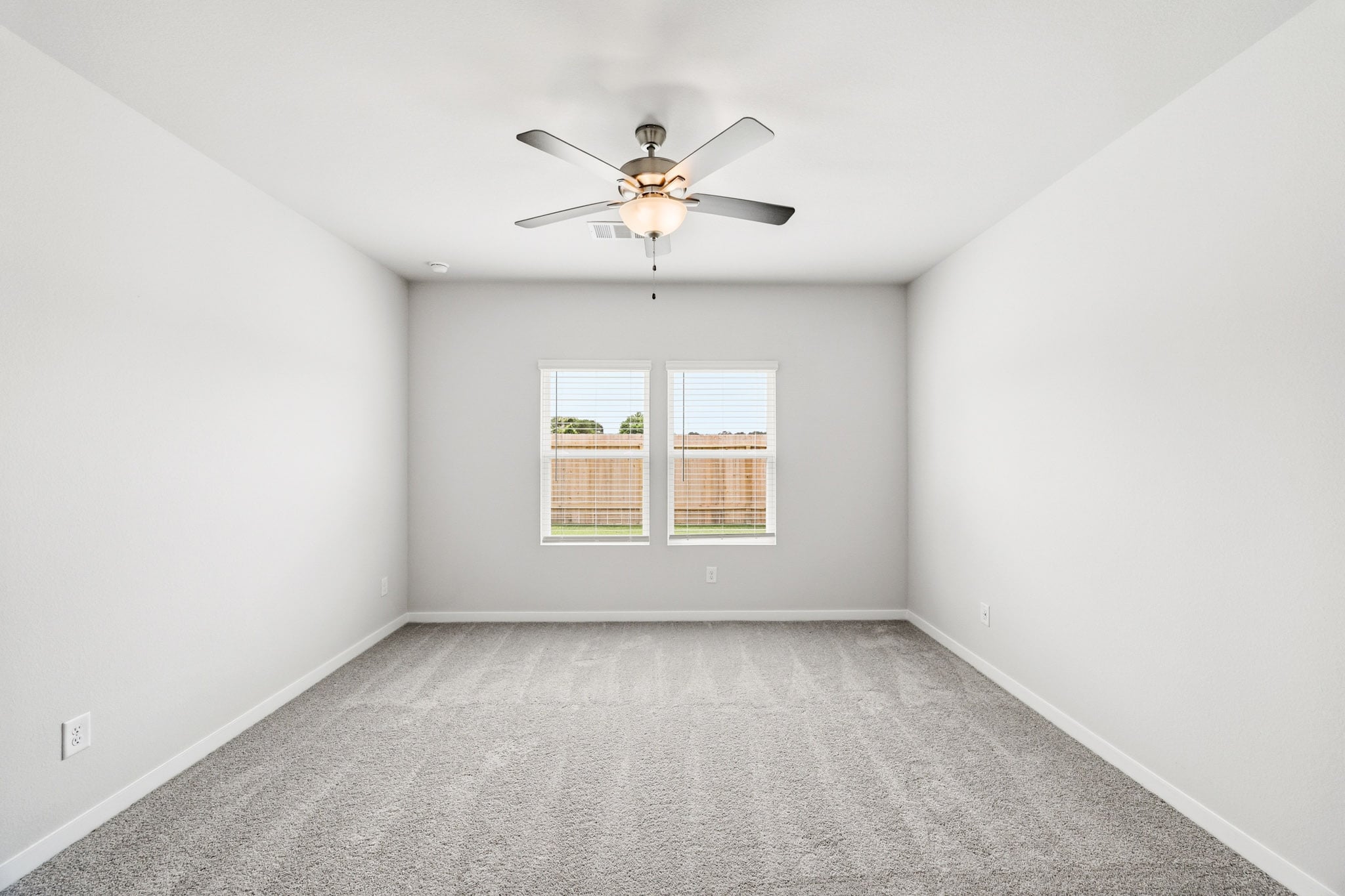 A ceiling fan in a room.