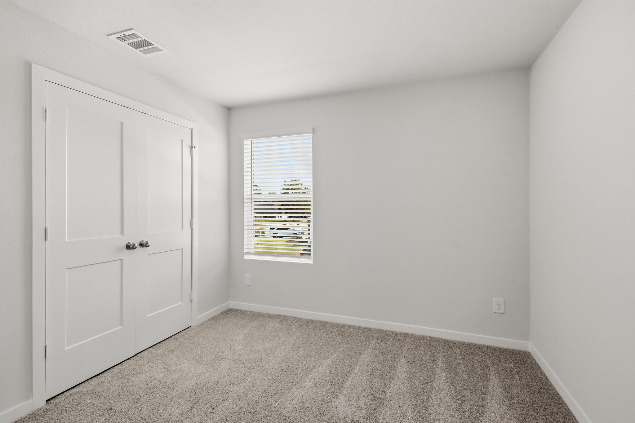 A room with white doors.