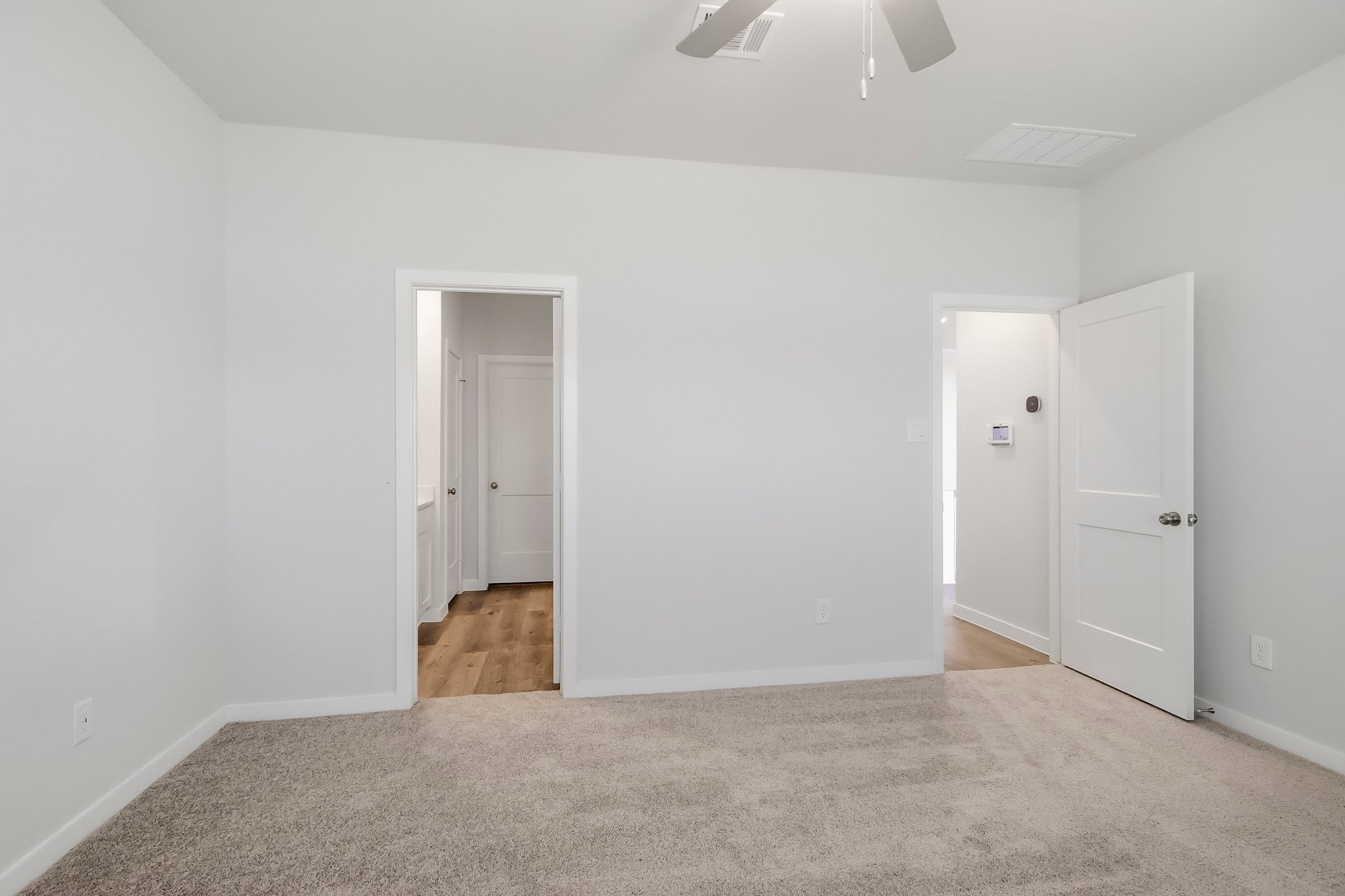 A room with white doors.