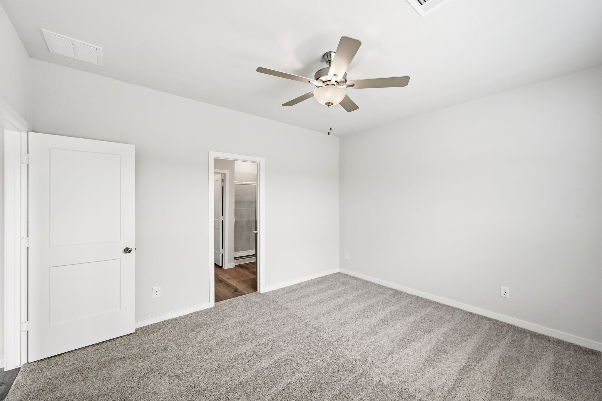 A ceiling fan in a room.