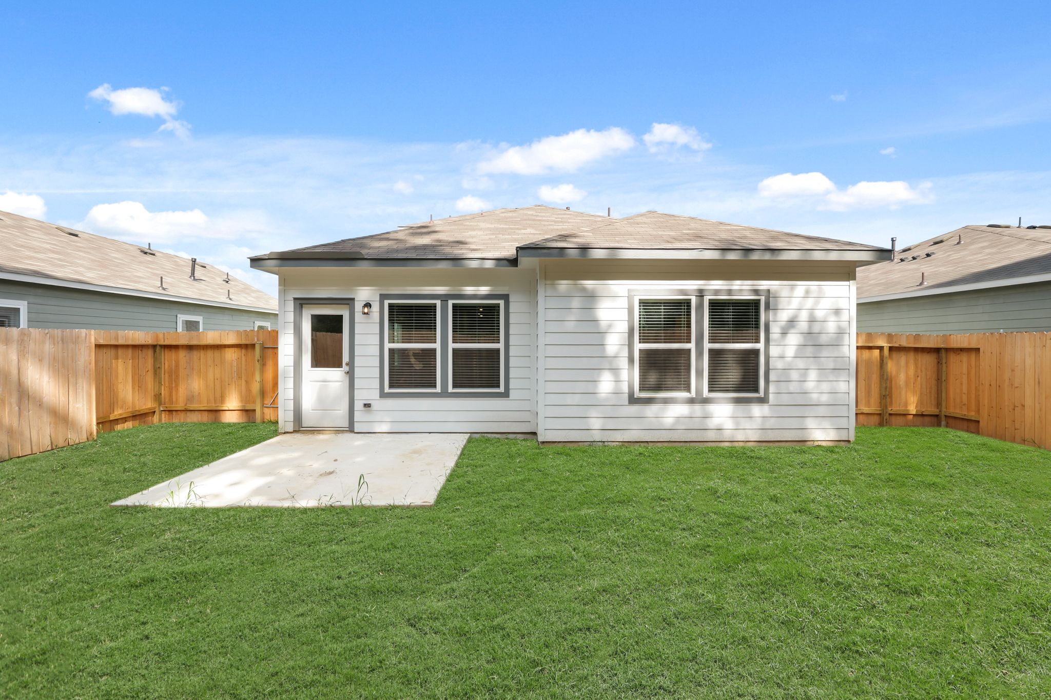 A house with a fence around it.