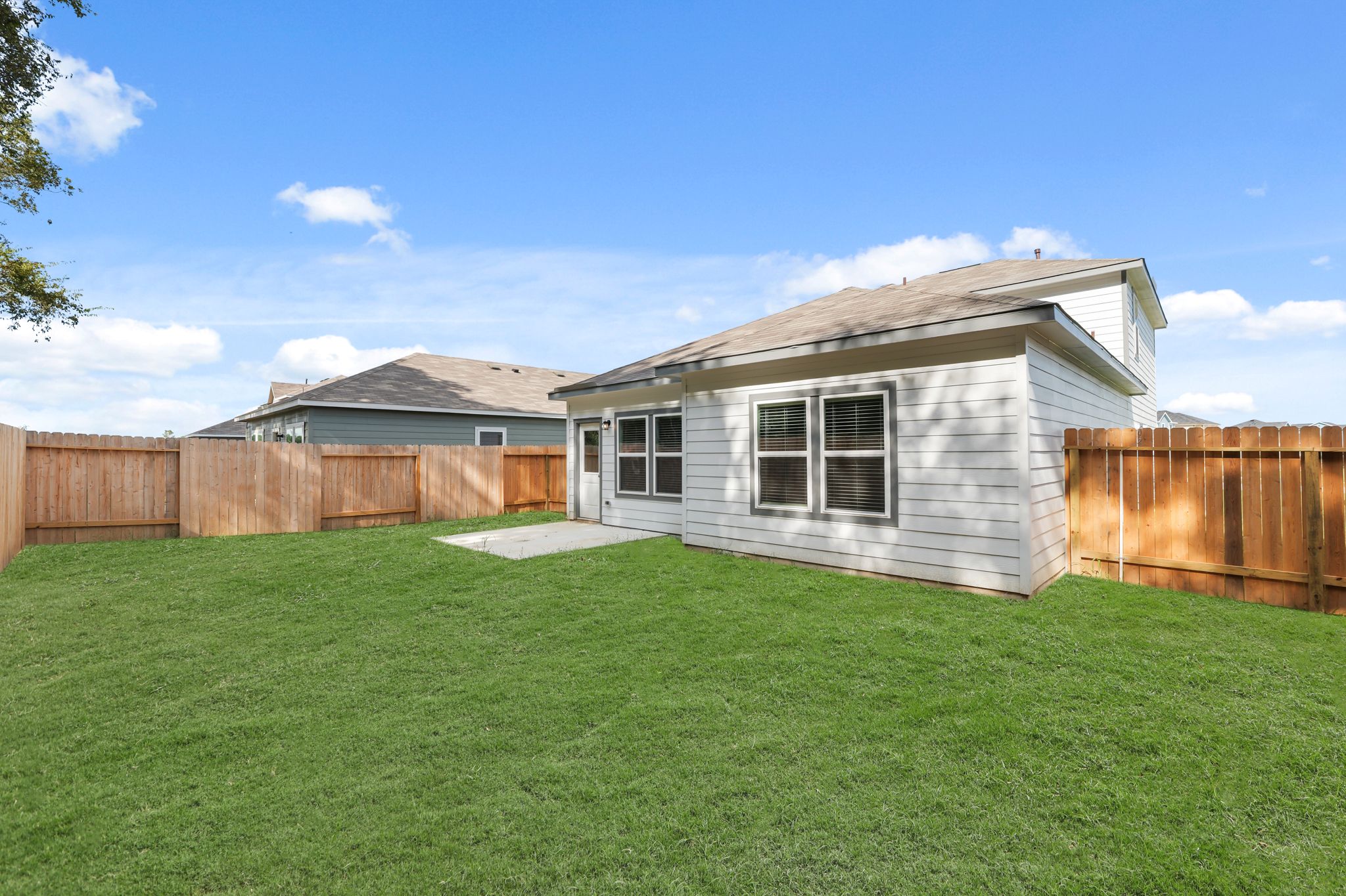 A house with a fence around it.