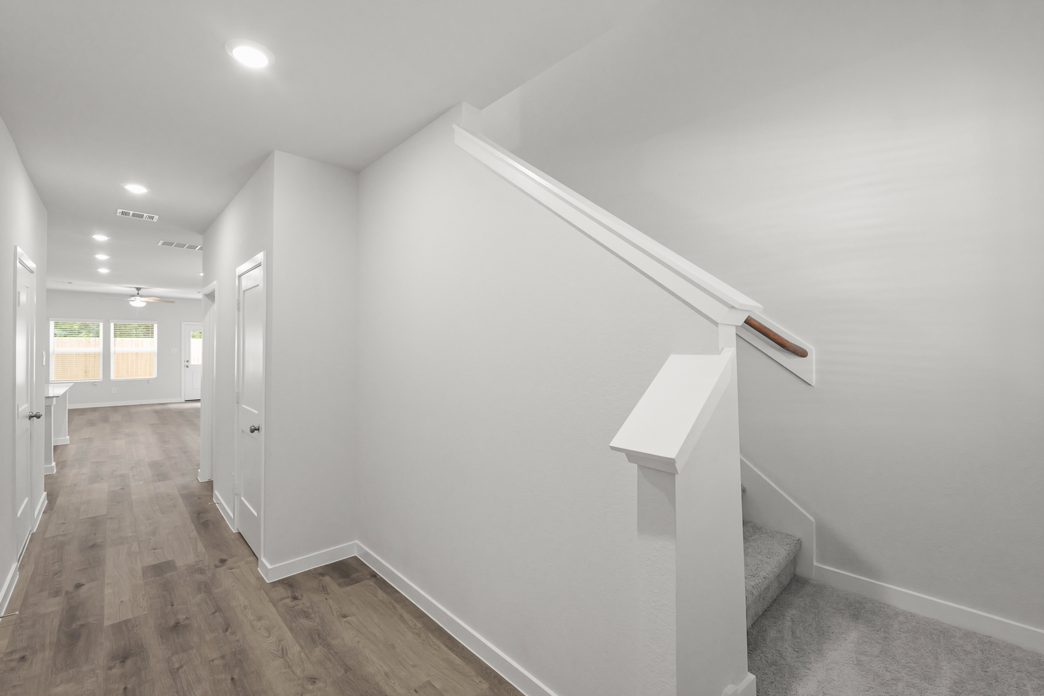 A white staircase in a house.