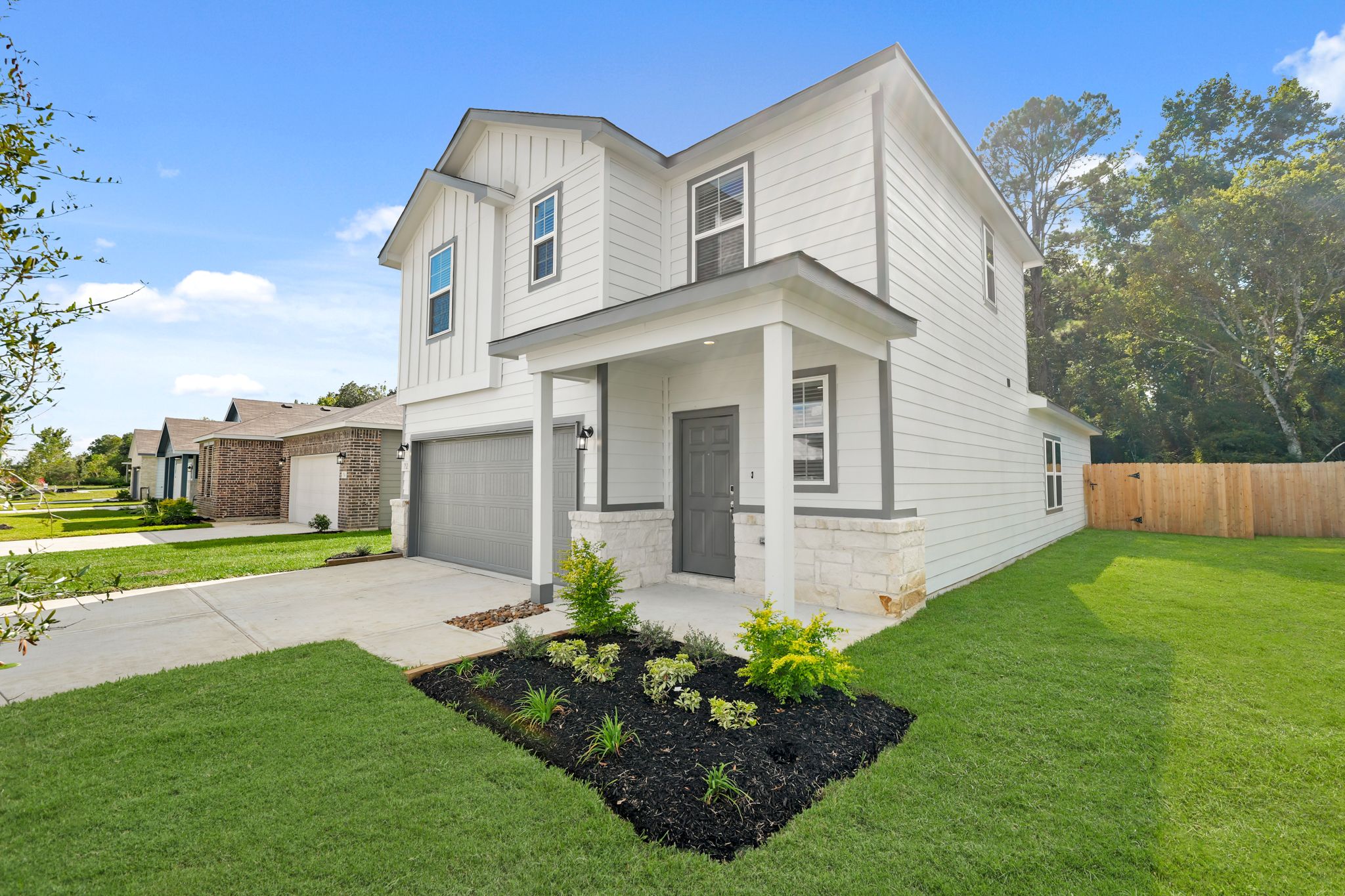 A house with a large front yard.