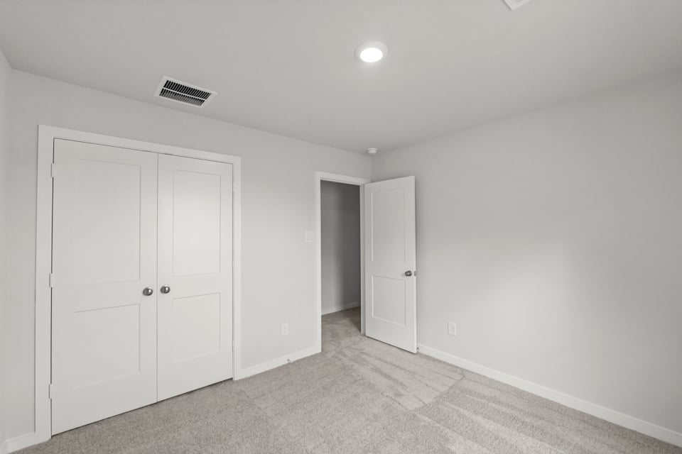 A room with white doors.