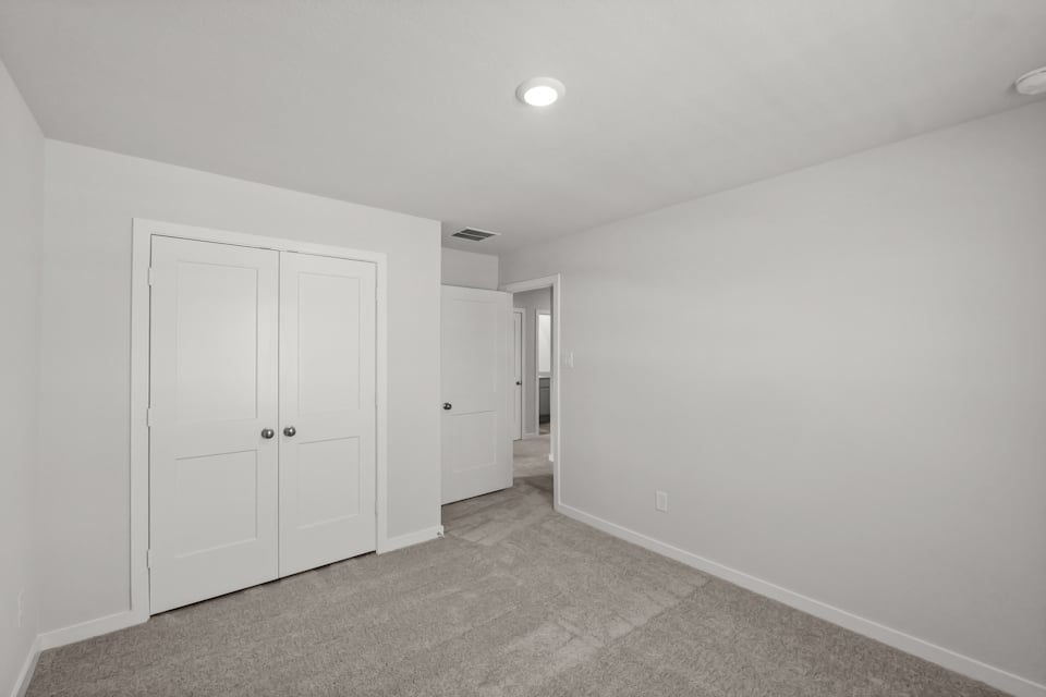 A room with white doors.