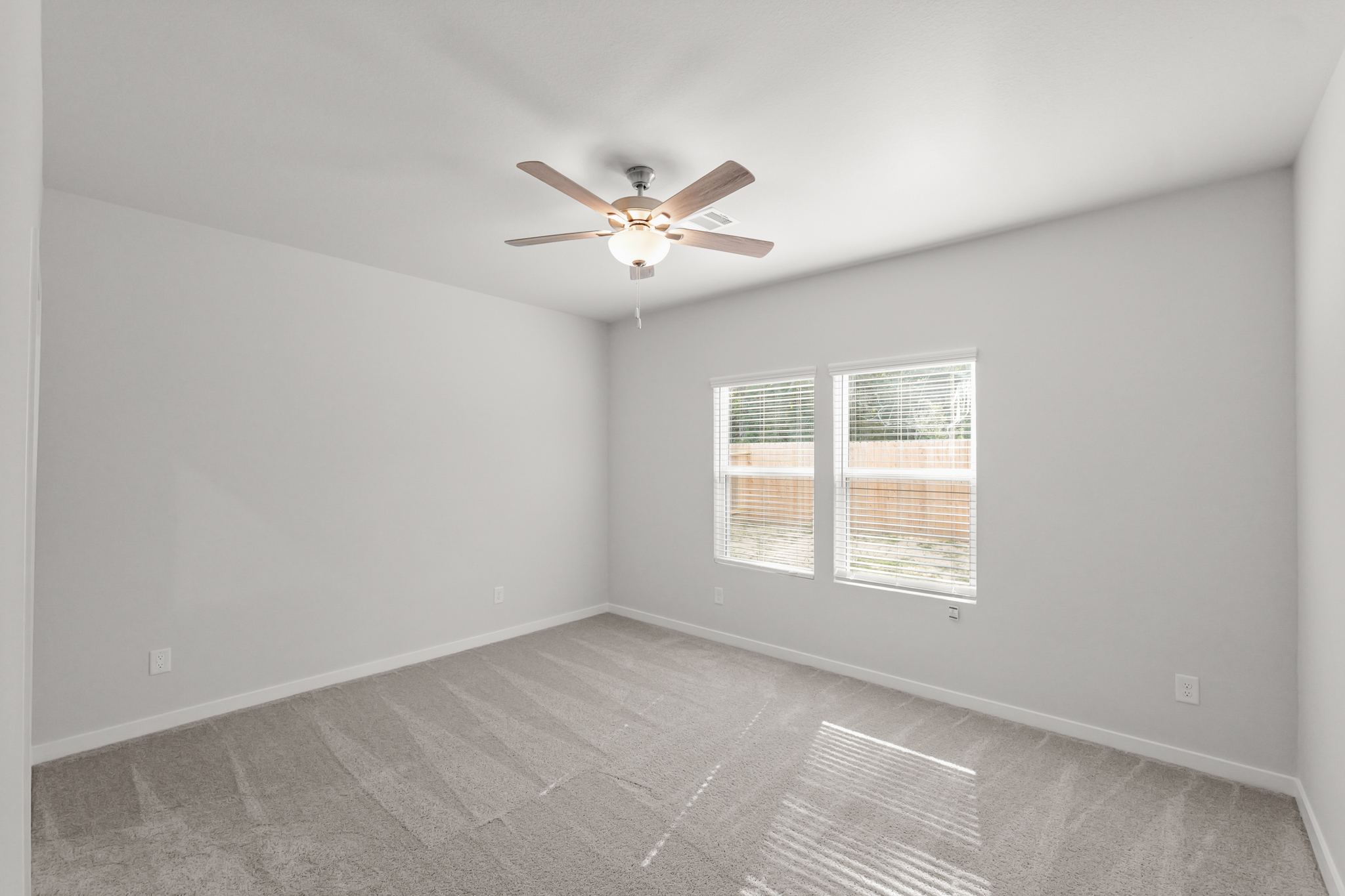 A ceiling fan in a room.