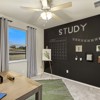 Santiago model downstairs bedroom at Hidden Springs in New Braunfels, TX by Century Communities