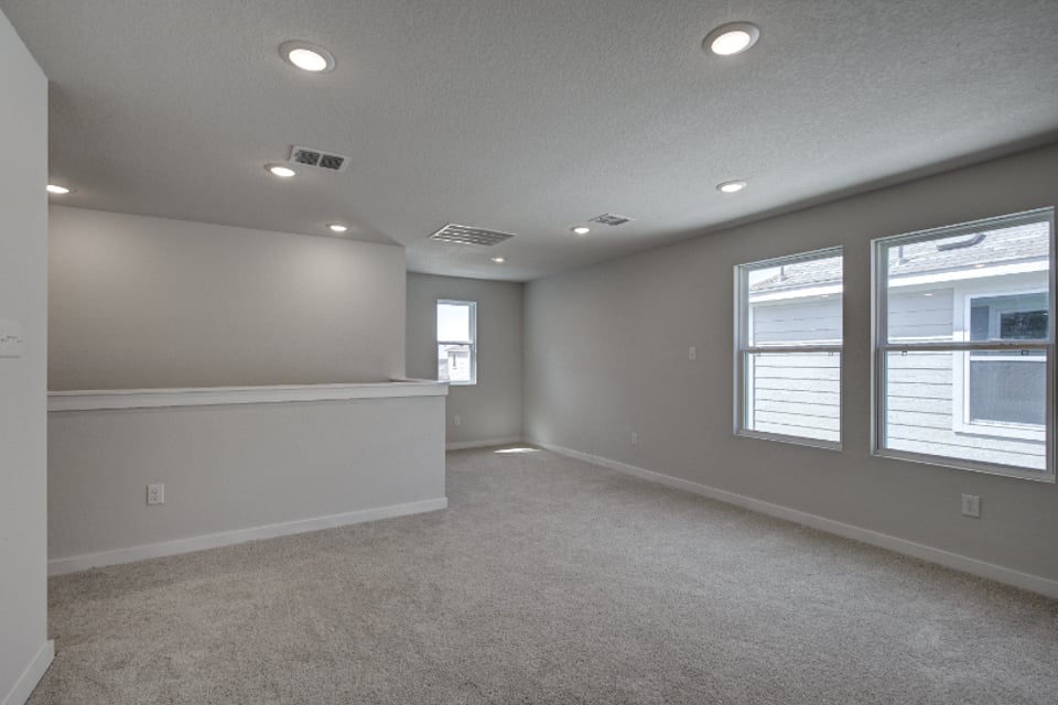 A room with a few windows.