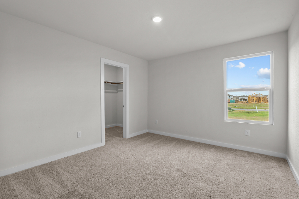 A room with a large window.