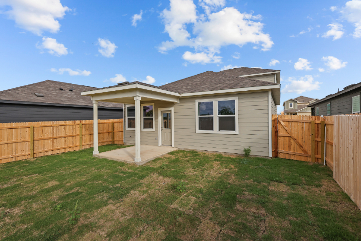 A house with a fence around it.