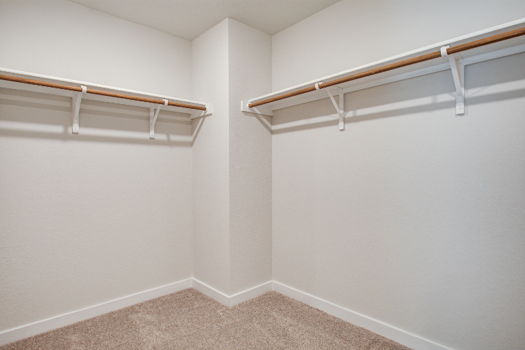 A white wall with a staircase.
