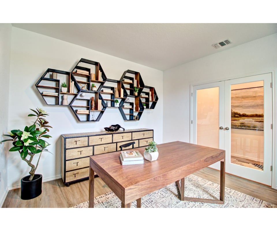 A table with a plant on it.