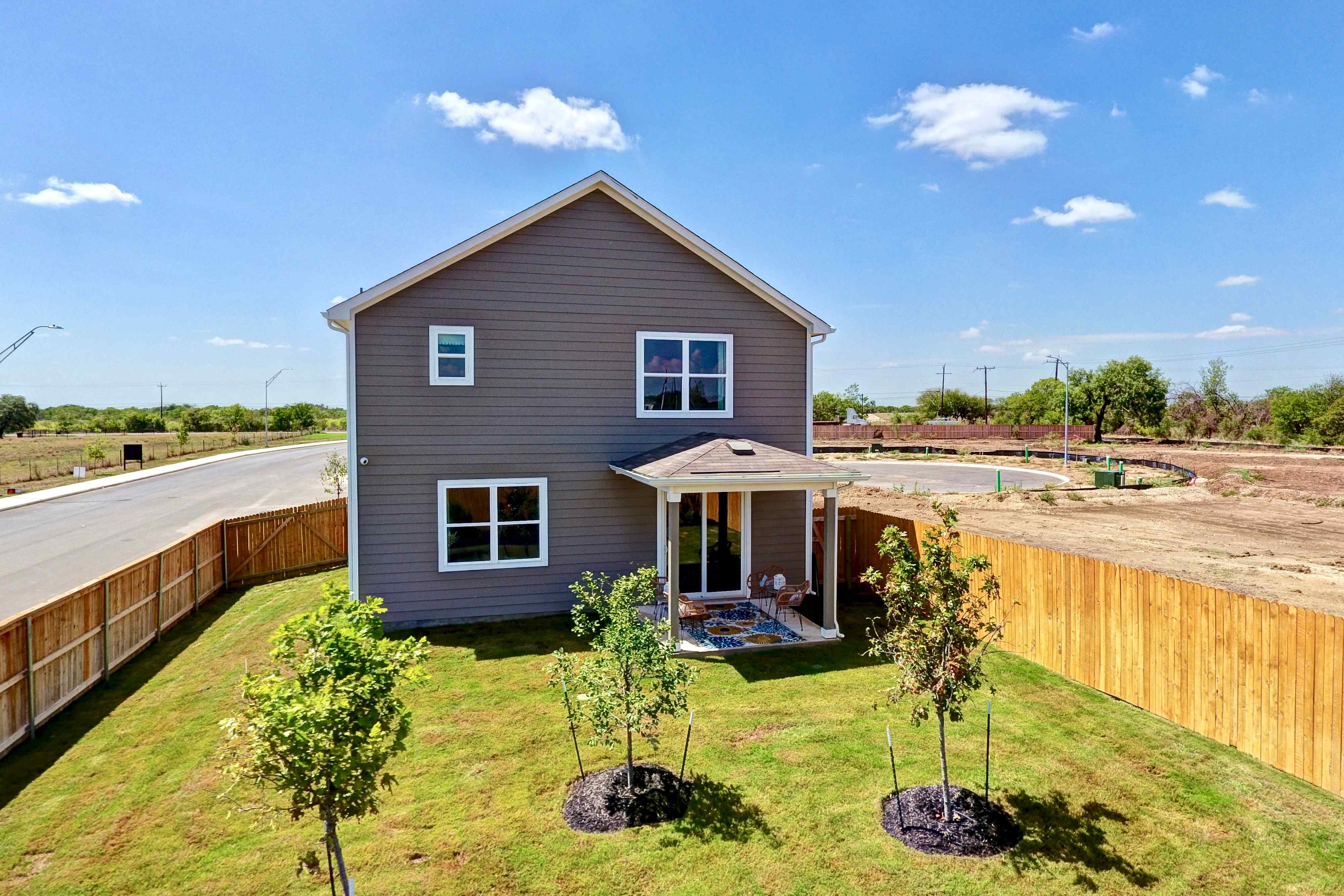 A house with a fence around it.