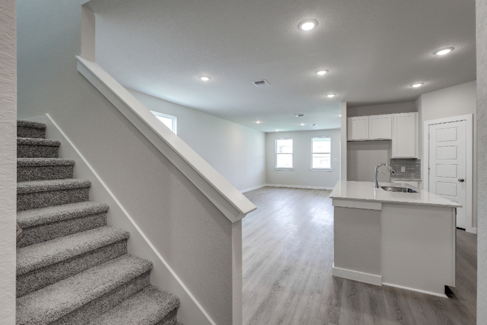 A kitchen and living room.