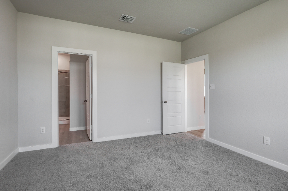 A room with white doors.