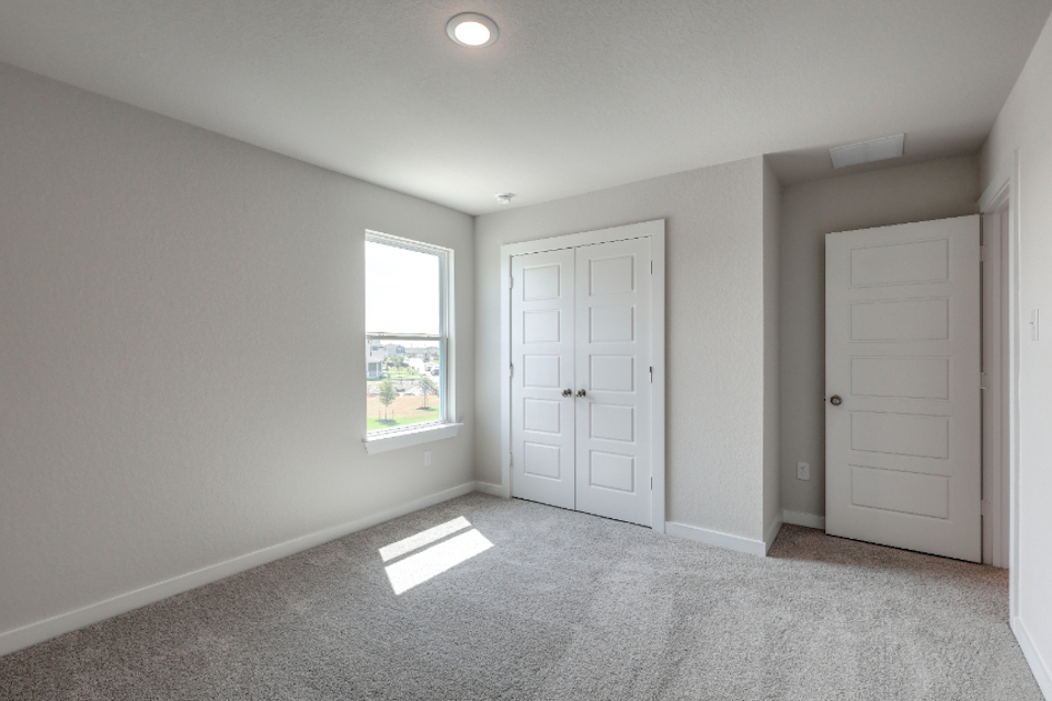 A room with white doors.