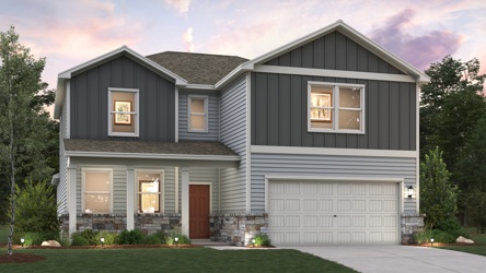 A grey house with a garage.