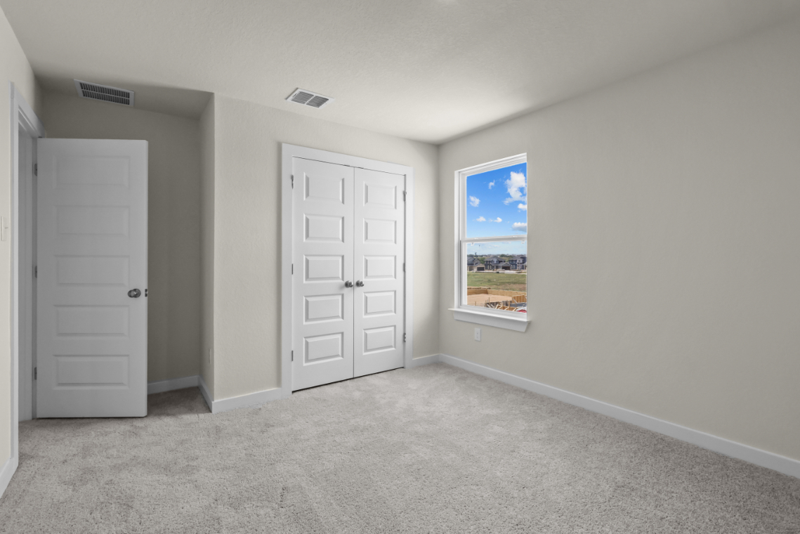 A room with white doors.